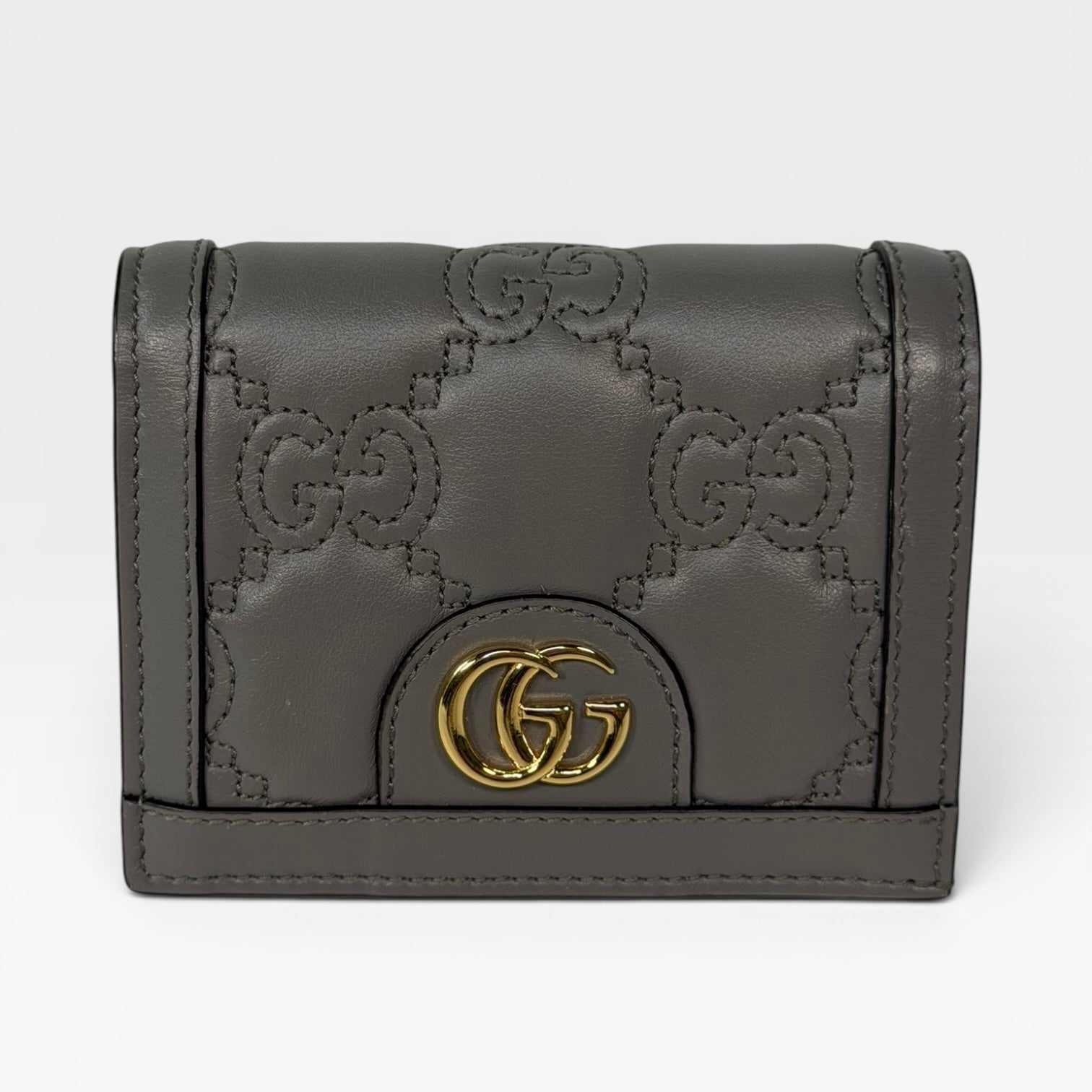 Gucci GG Embossed Wallet In Grey Leather With Gold Hardware. Authentic and preloved in excellent condition.