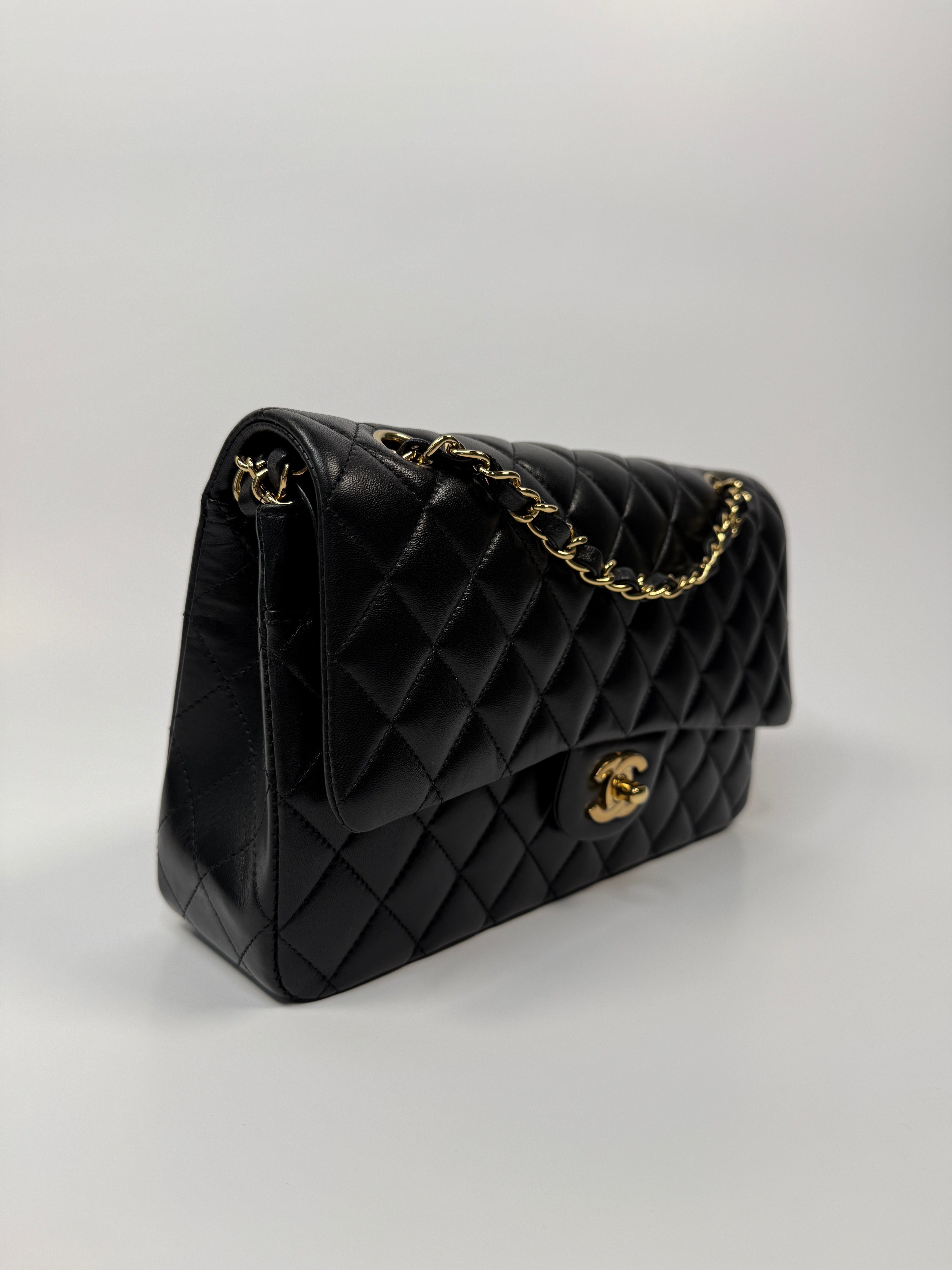 Chanel Medium Classic Double Flap Black Lambskin With Gold Hardware
Pre Loved & Authentic 
