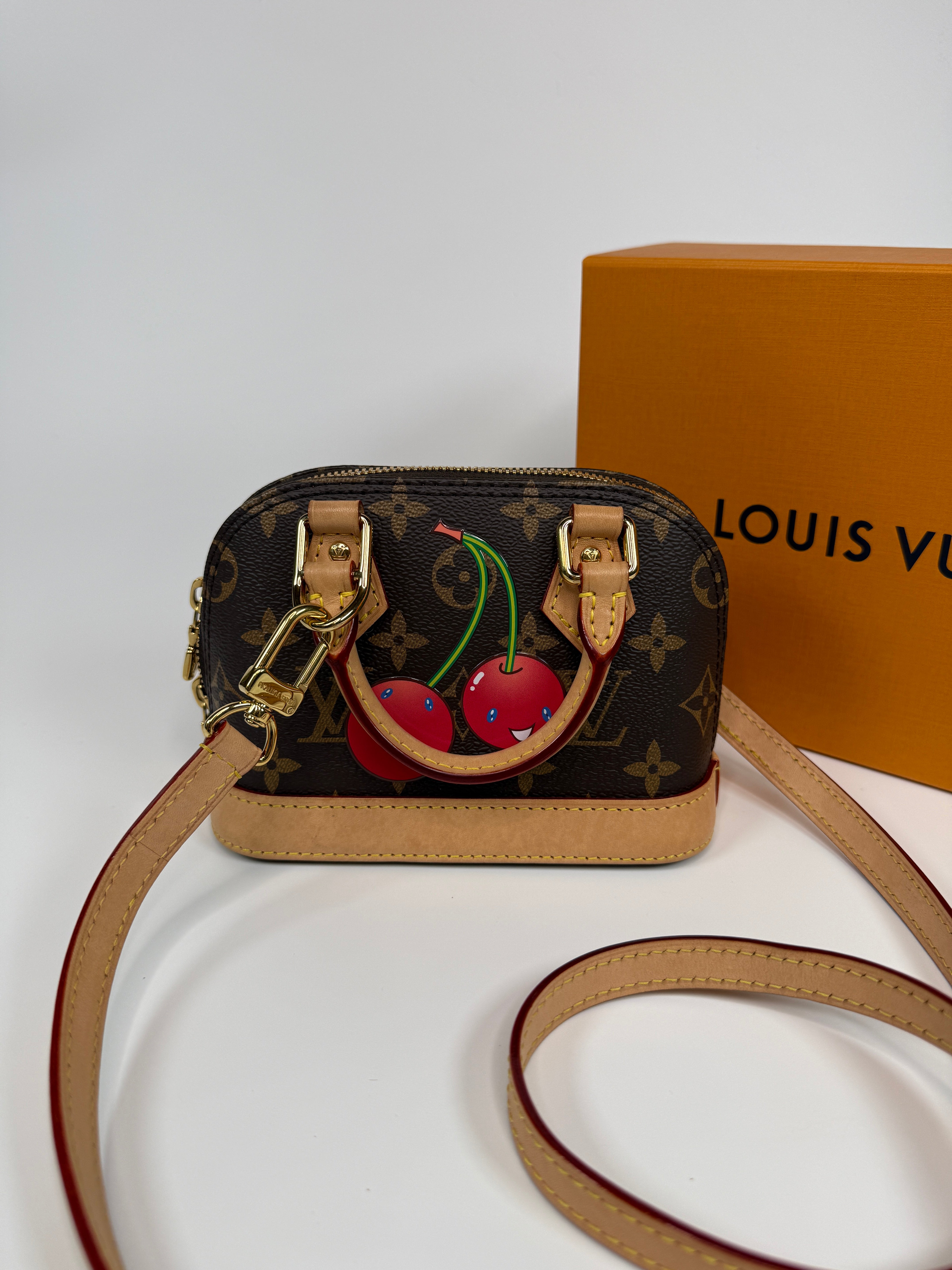 Authentic and preloved Louis Vuitton X Takashi Murakami Nano Alma Cherry Brown Monogram. Excellent condition. 100% Authenticity guarantee. Verified by Luxe Cheshire. 