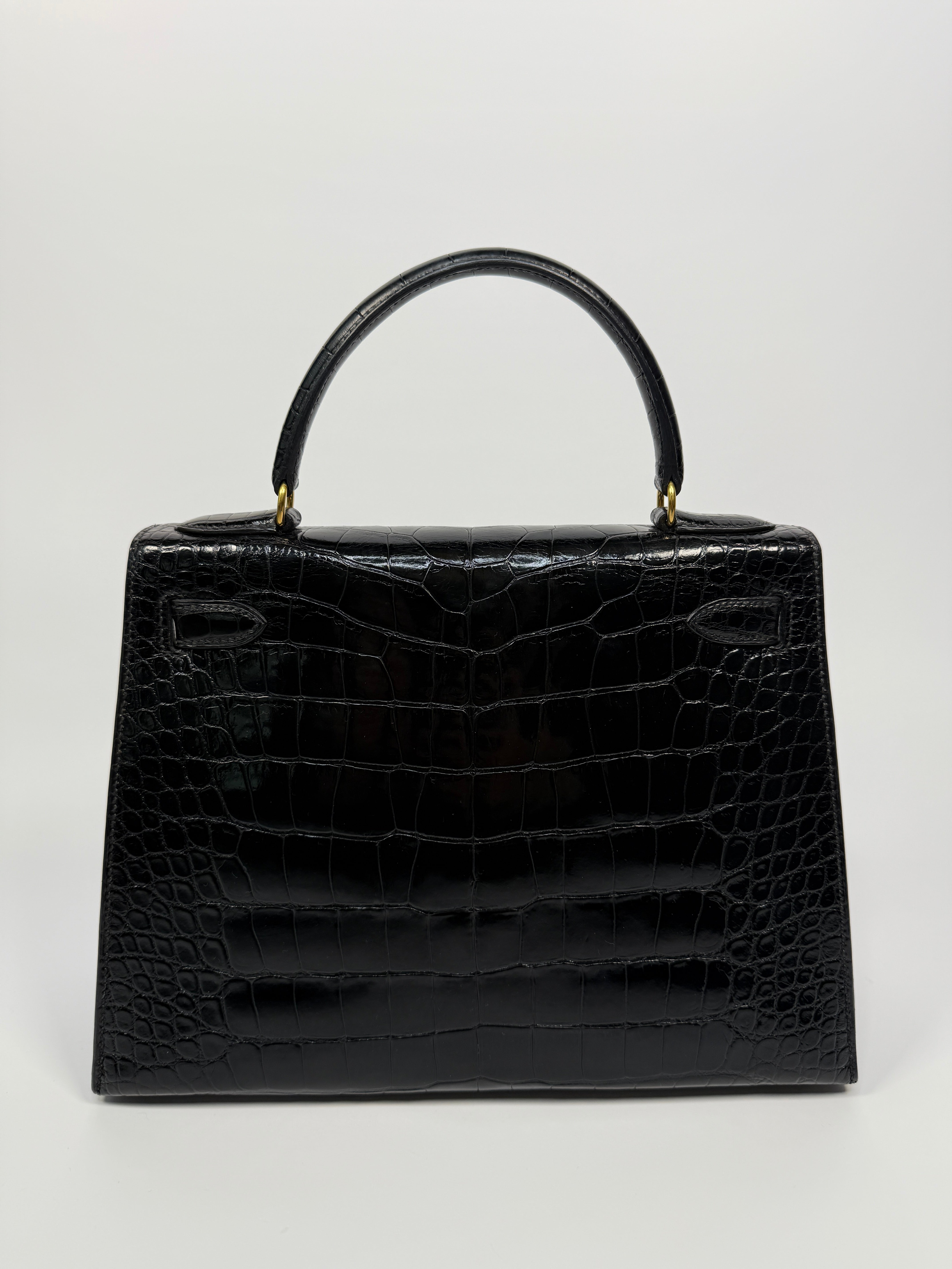 Hermès Vintage Kelly 28 In Shiny Black Crocodile With Gold Hardware Authentic