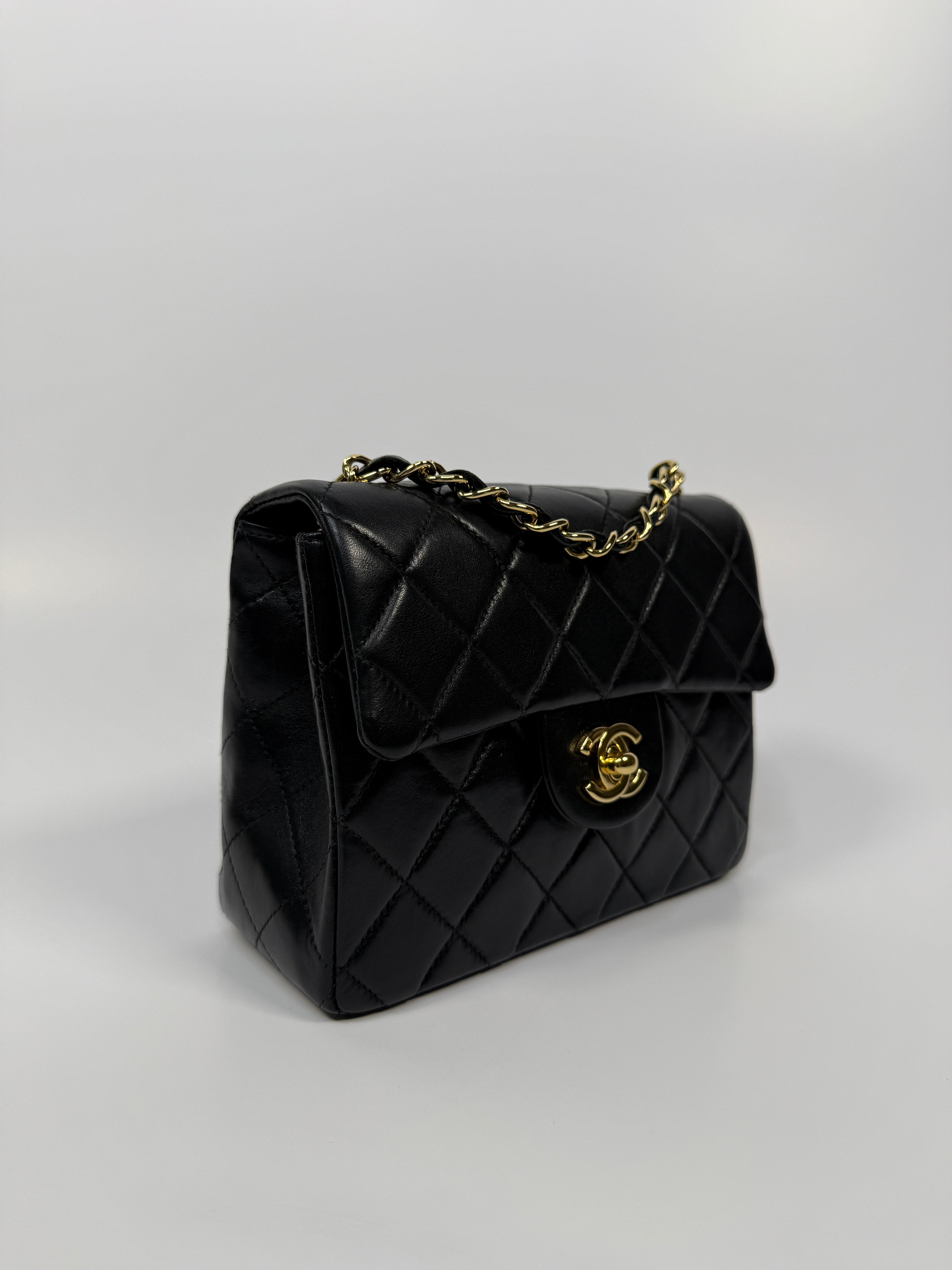 Chanel Black Square Vintage Flap Bag In Lambskin With Gold Hardware
Pre Loved & Authentic 