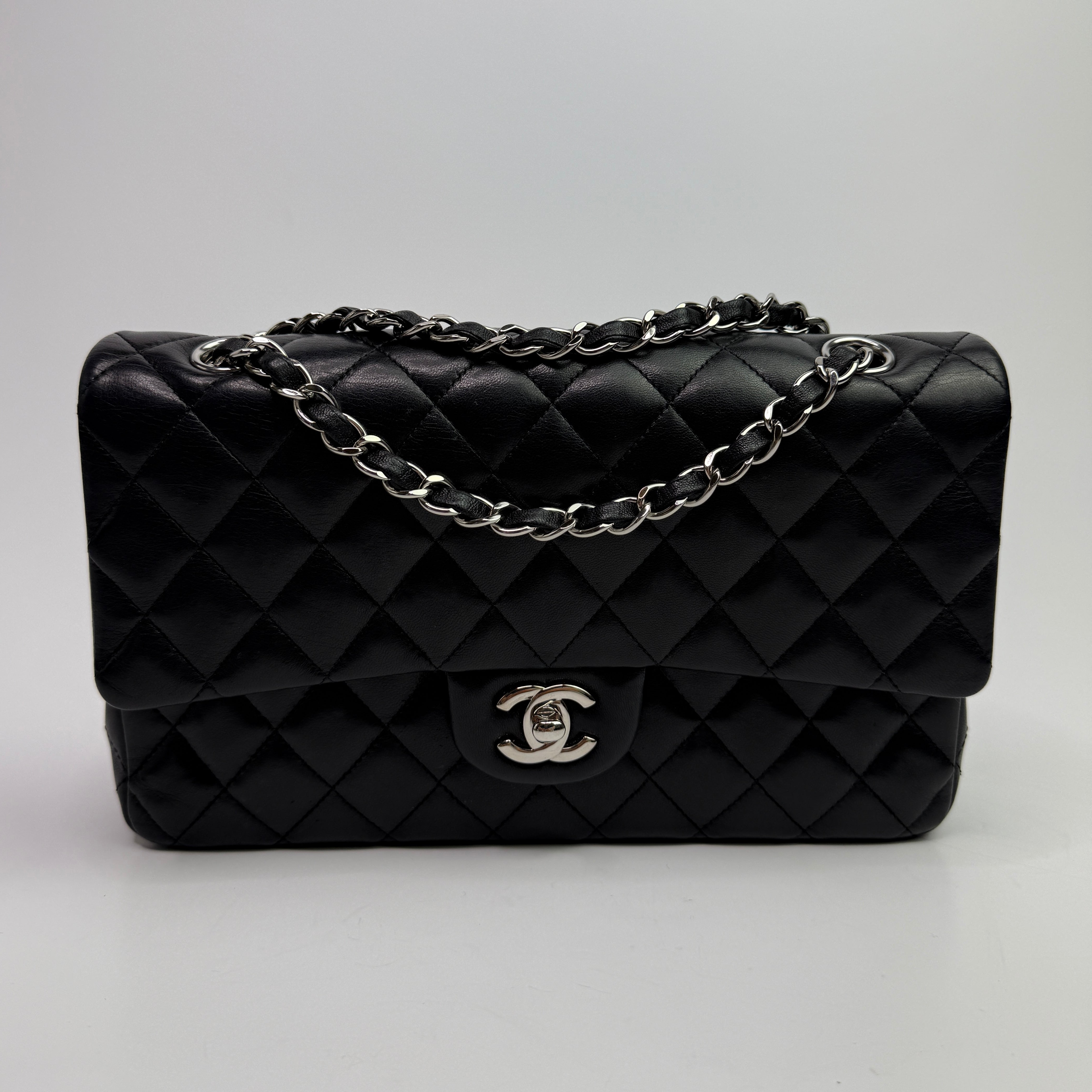 Chanel Medium Classic Double Flap Black Lambskin With Silver Hardware
Pre Loved & Authentic 