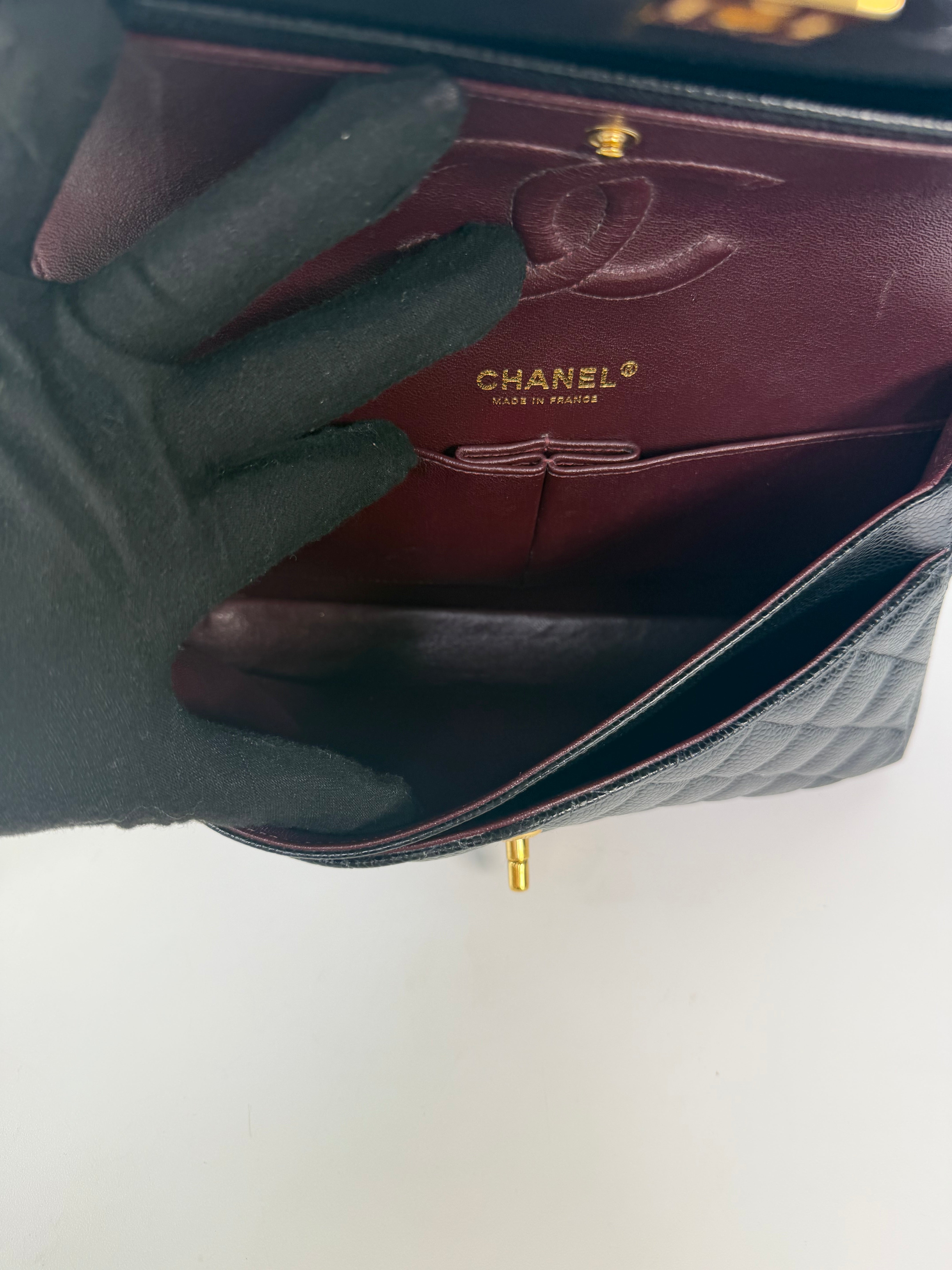 Chanel Medium Classic Double Flap In Black Caviar Leather Gold Hardware 100% authentic and preloved in excellent condition