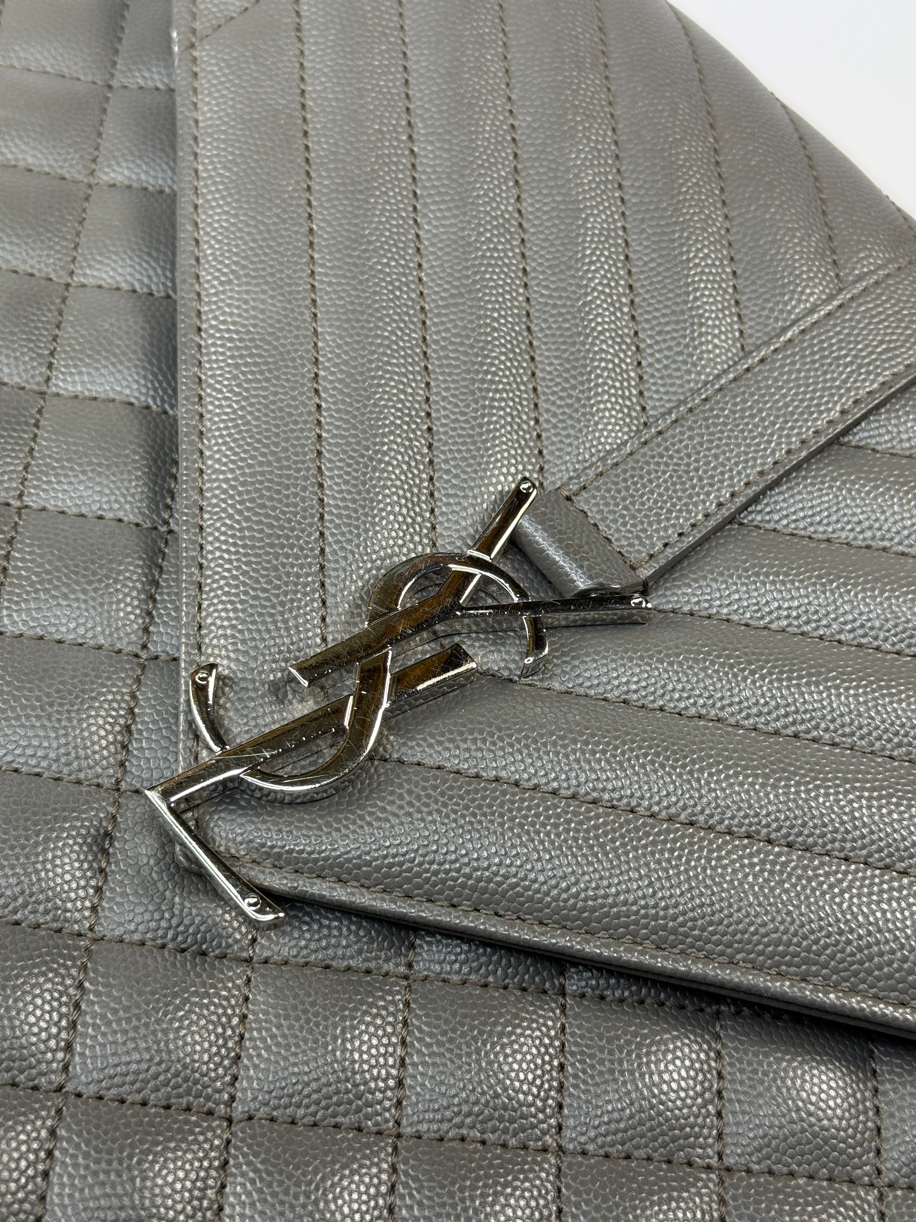 Saint Laurent Large Envelope Shoulder Bag In Grey Grained Leather With Silver Hardware. Excellent condition. Authentic and preloved. 