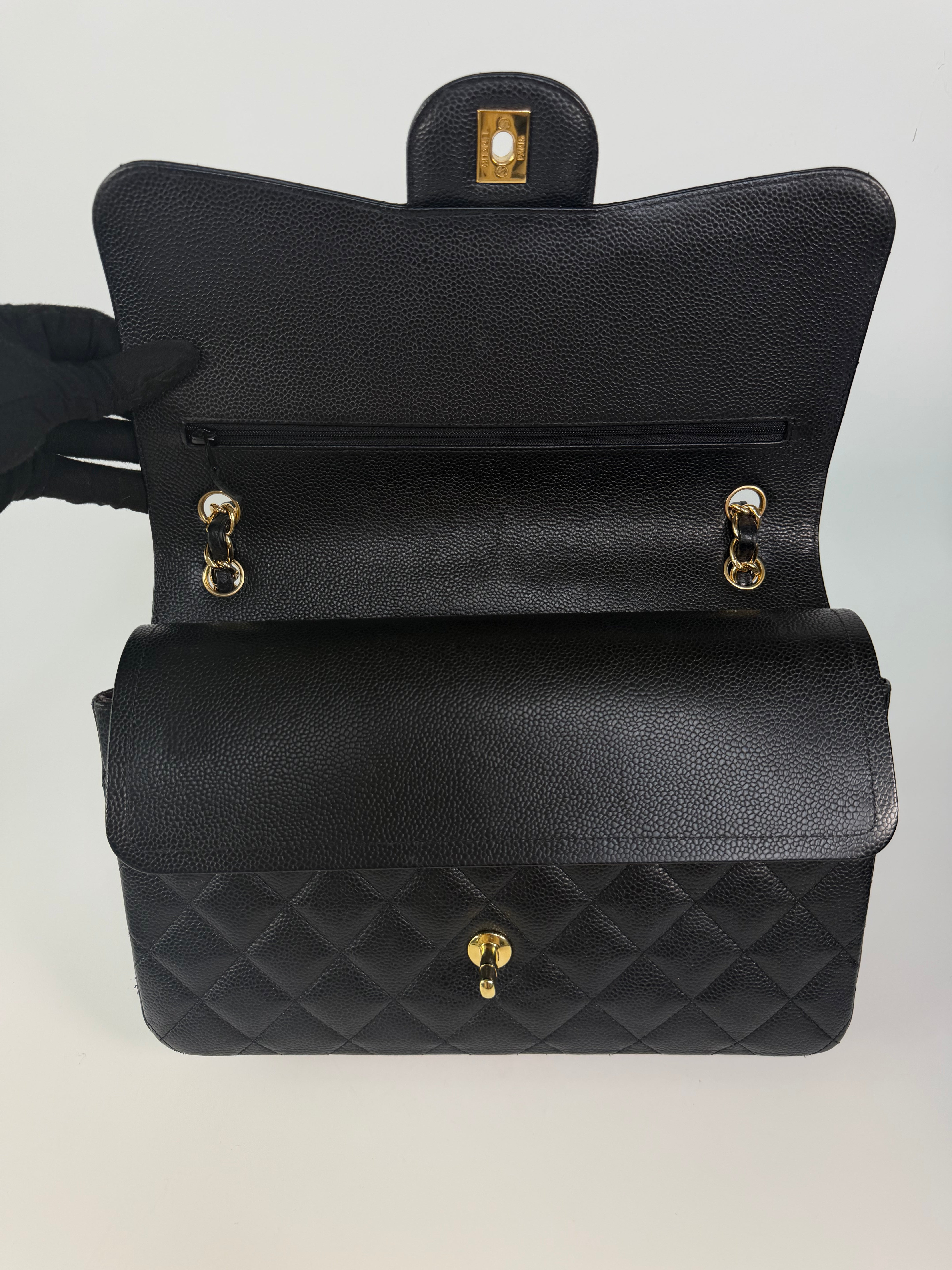 Chanel Jumbo Classic Flap Bag In Black Caviar Leather With Gold Hardware 100% authentic and preloved in excellent condition