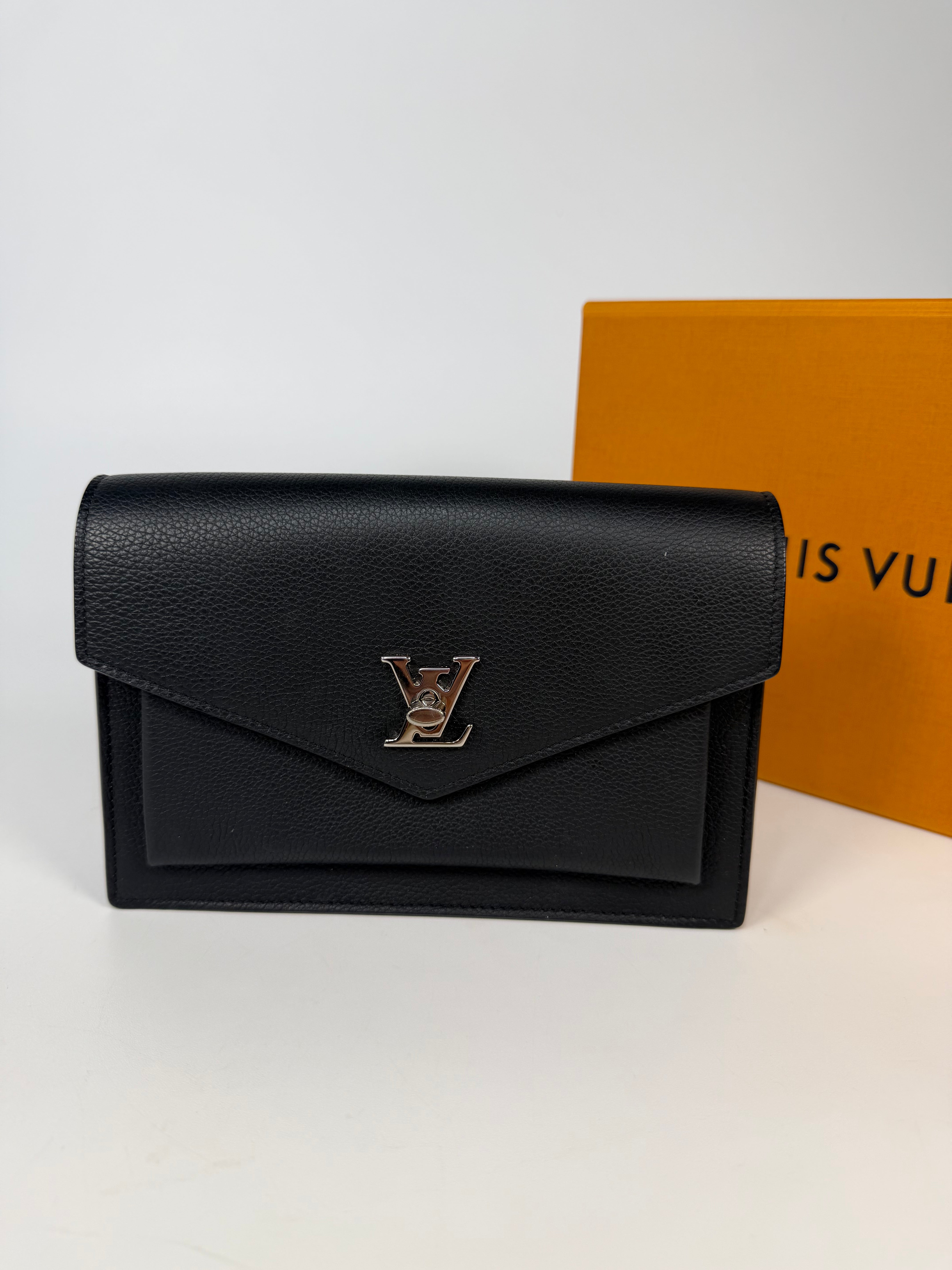 Louis Vuitton Pochette Chain MyLockMe In Black Leather With Silver Hardware in excellent condition 100% authentic and preloved 