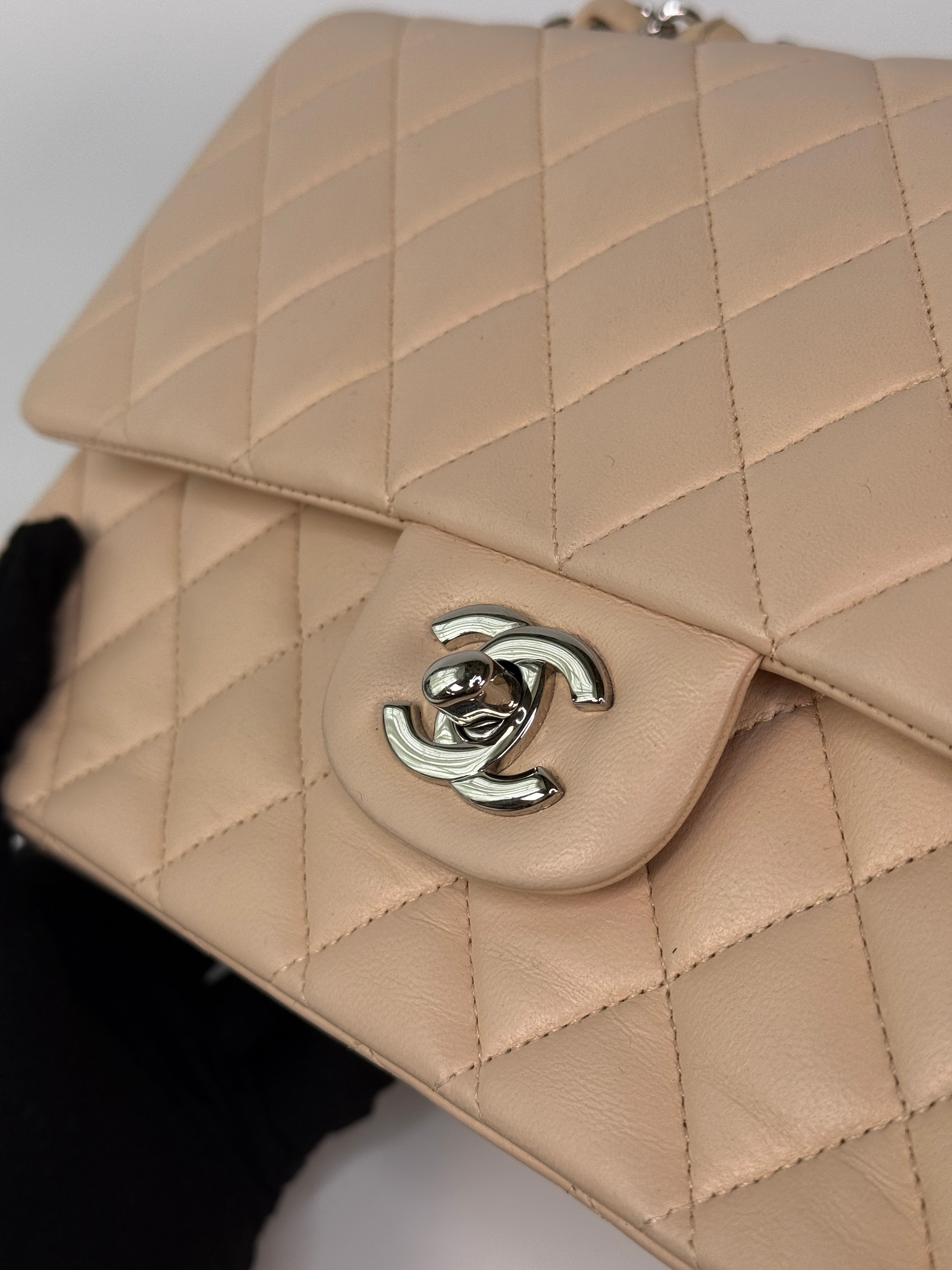 Authentic and preloved Chanel Medium Classic Double Flap Light Beige Lambskin Leather With Silver Hardware