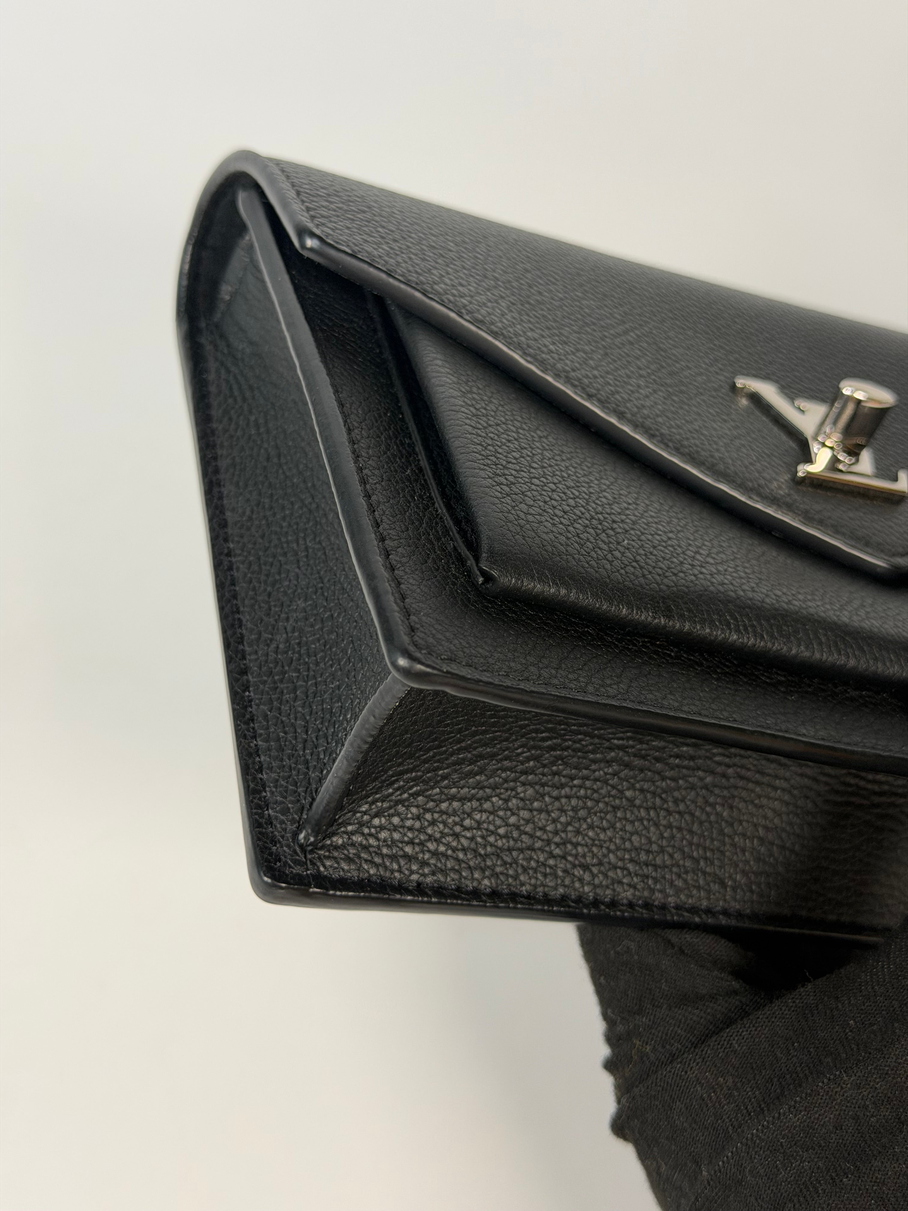 Louis Vuitton Pochette Chain MyLockMe In Black Leather With Silver Hardware in excellent condition 100% authentic and preloved 