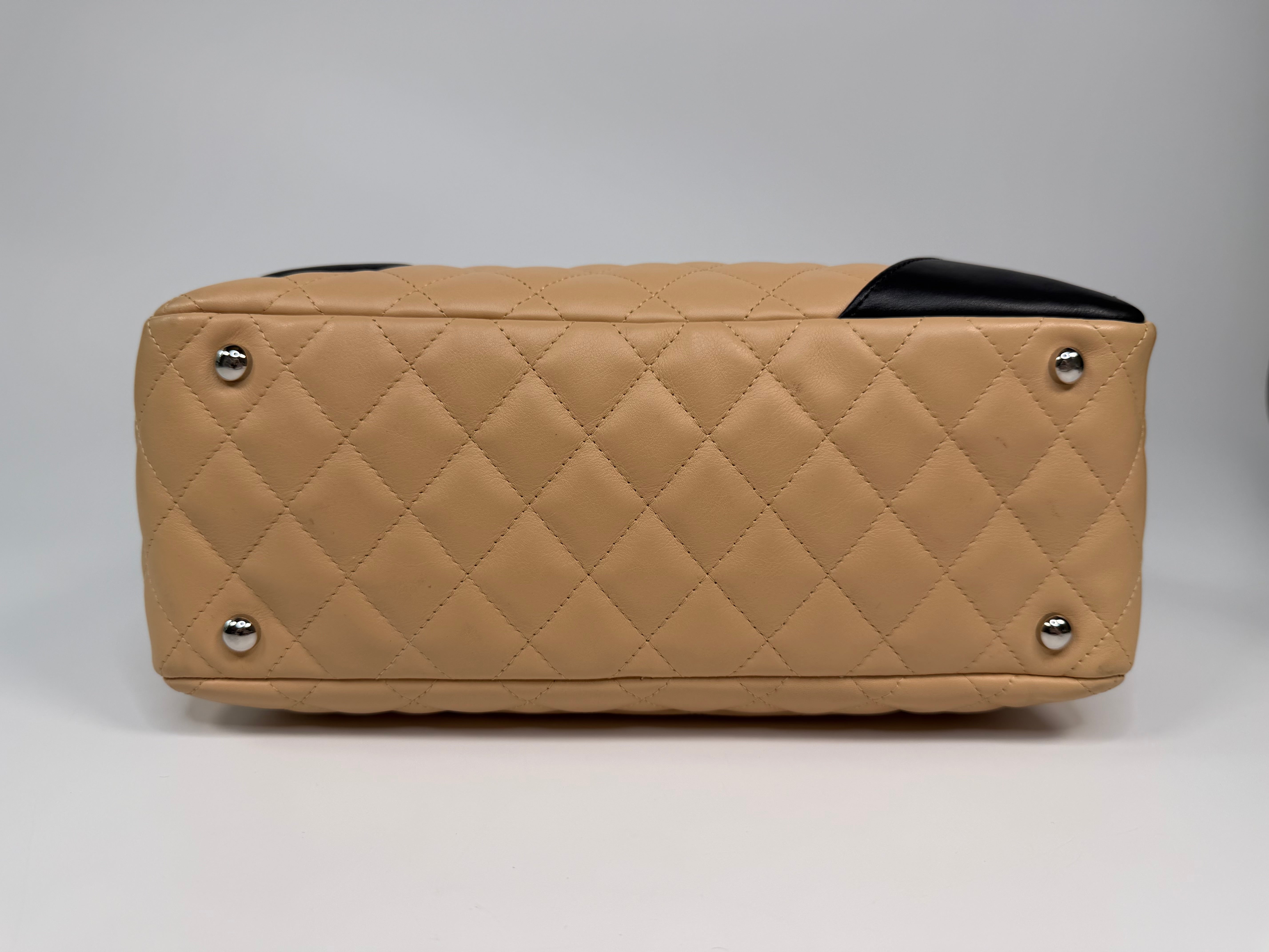 Chanel Cambon Bowling Bag In Beige / Black Leather With Silver Hardware. Authentic and preloved in excellent condition.