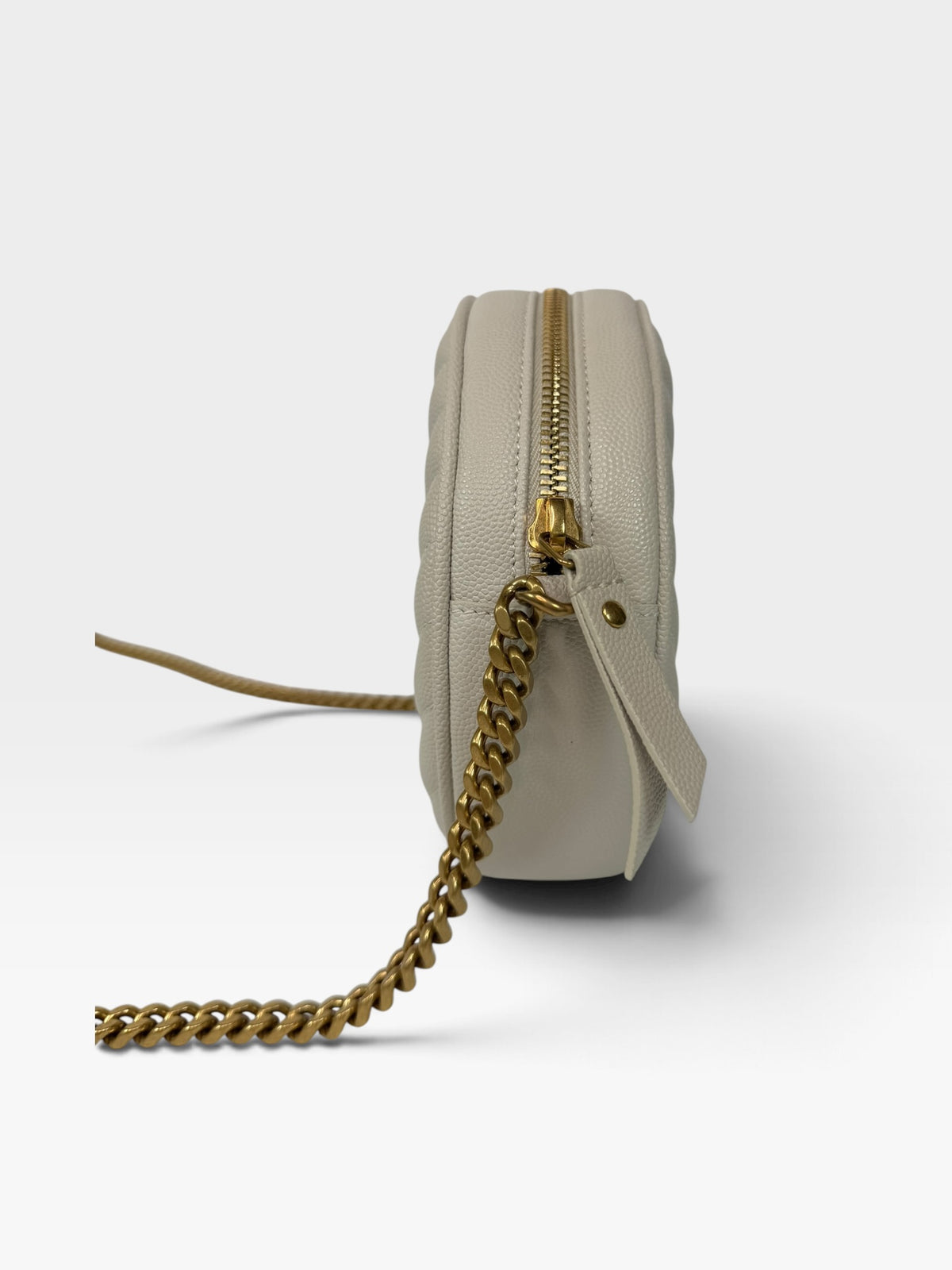 Saint Laurent Vinyle Round Bag In Stone Matelasse Chevron With Gold Hardware. 100% authentic and preloved in excellent condition