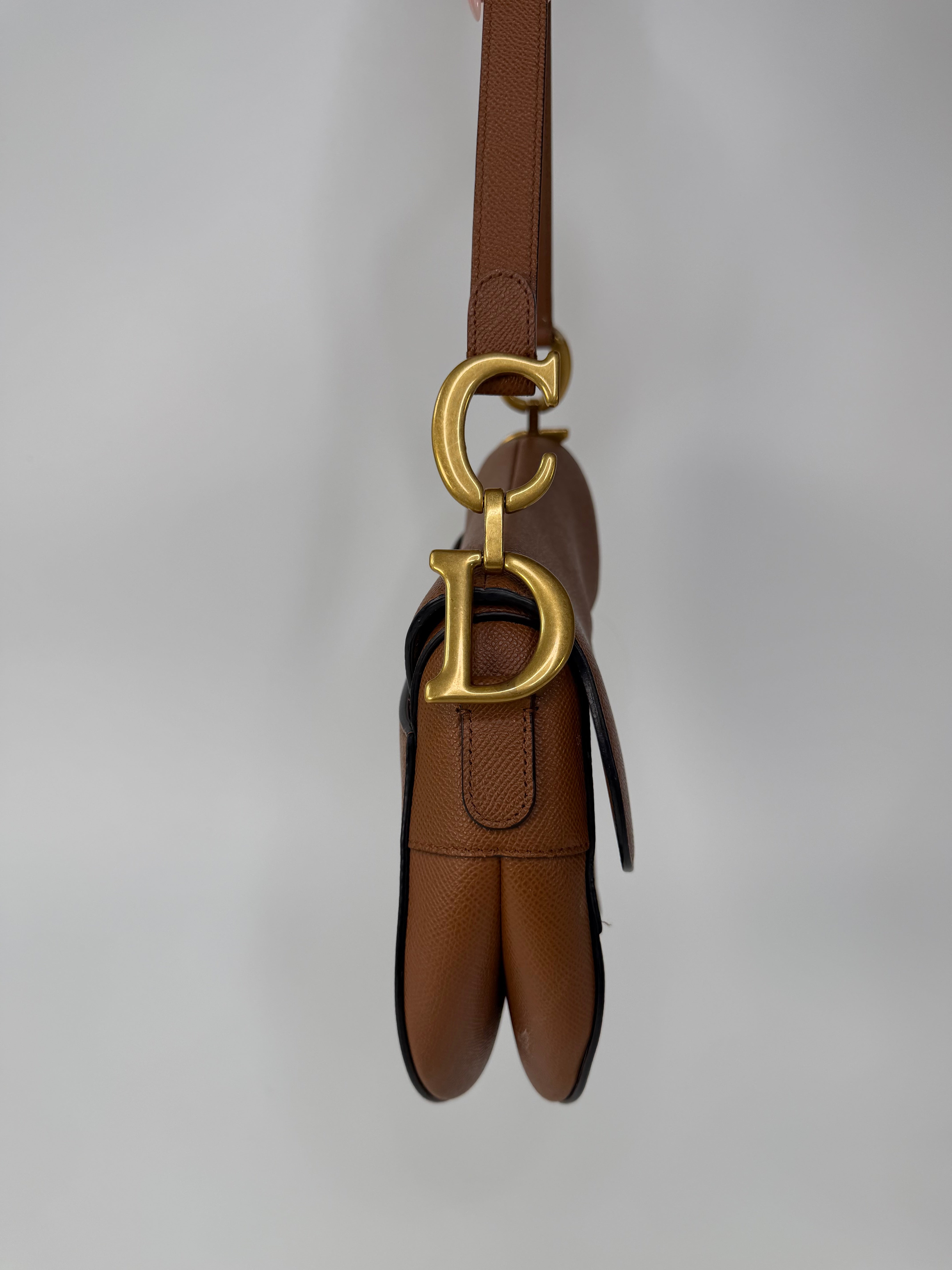 Christian Dior Saddle Bag In Golden Calfskin Gold Hardware. 100% authentic and preloved in excellent condition.