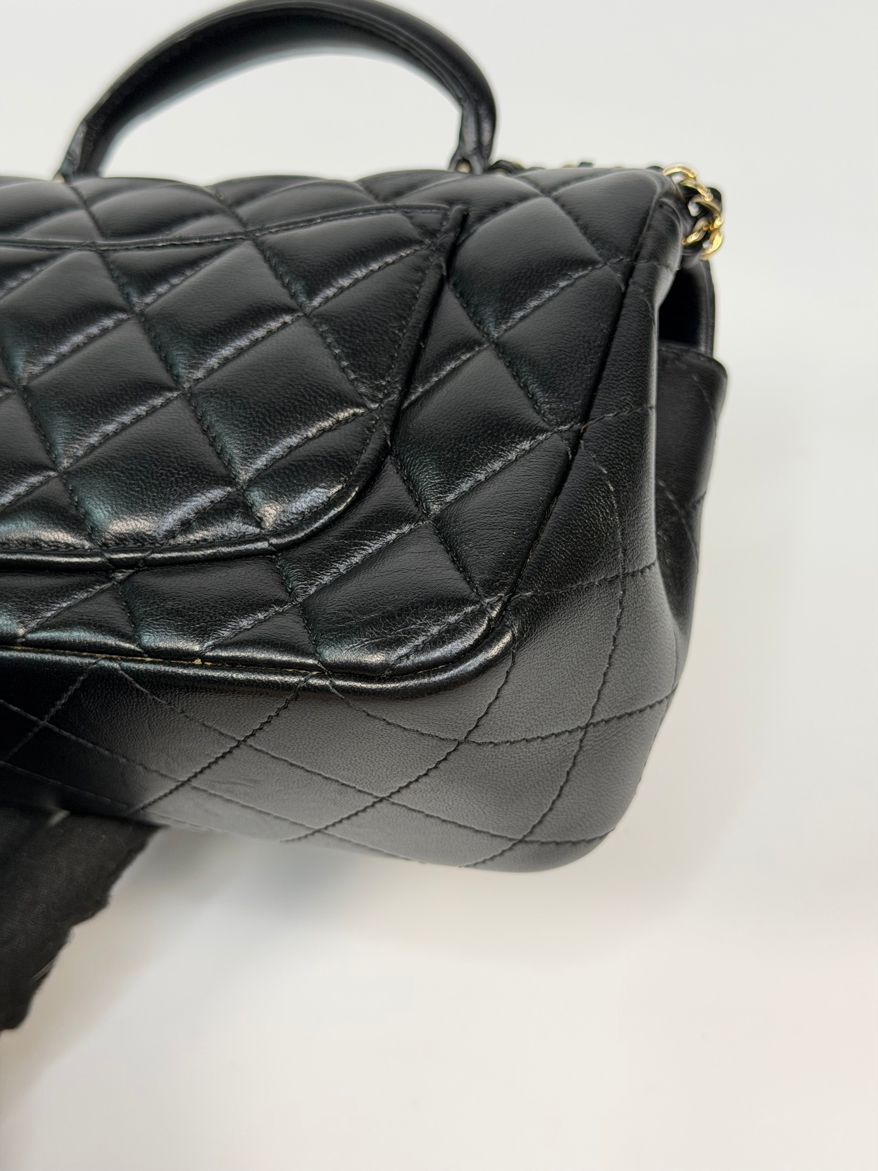 Chanel Mini Rectangle Top Handle In Black Lambskin Leather With Pale Gold Hardware. Authentic and preloved in excellent condition.