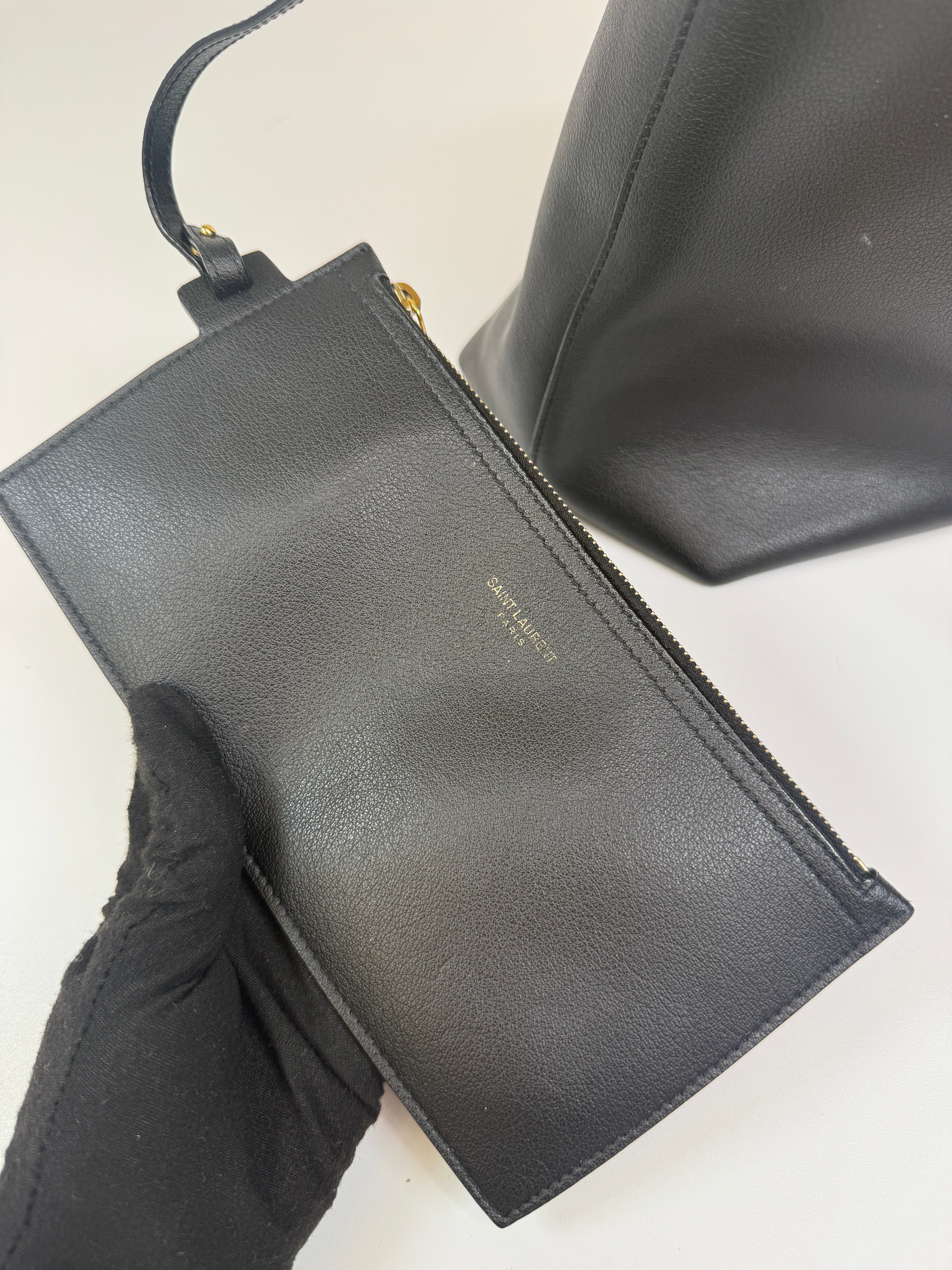 aAuthentic and preloved Saint Laurent Shopping Tote In Black Leather. 100%  Authenticity guarantee 
