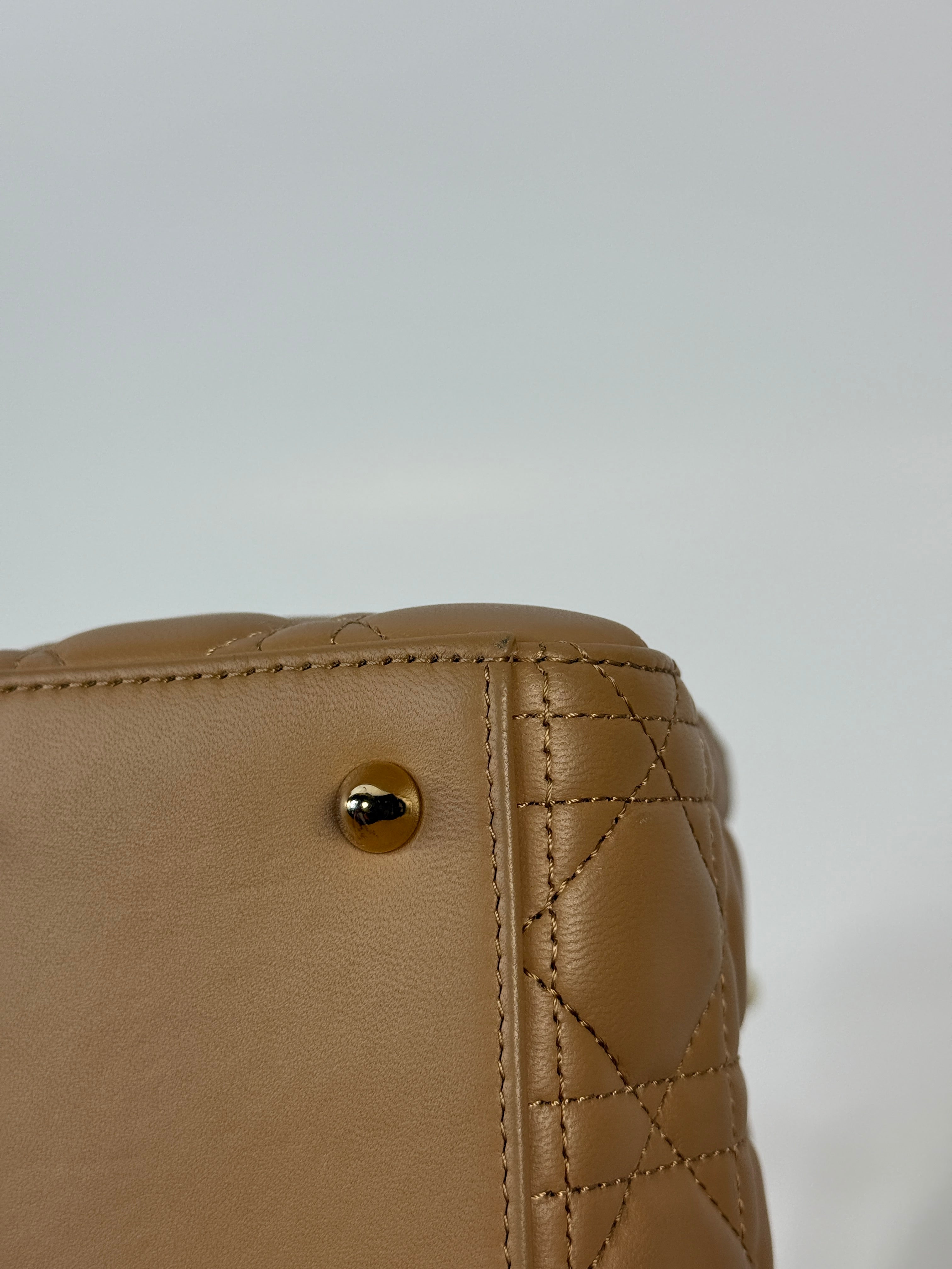 Authentic pre-loved Christian Dior Medium Lady Dior Bag in gold with gold hardware