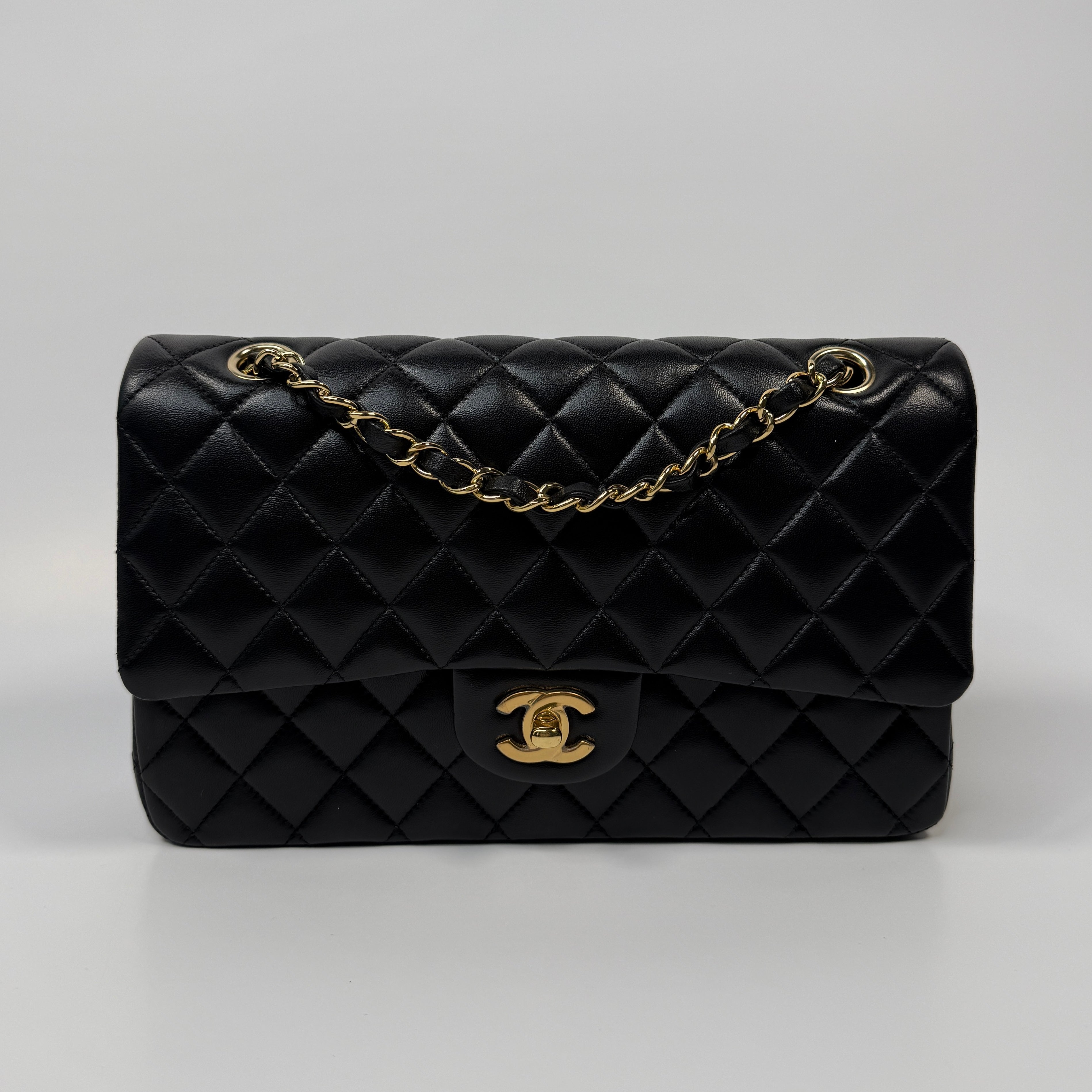 Chanel Medium Classic Double Flap Black Lambskin With Gold Hardware
Pre Loved & Authentic 
