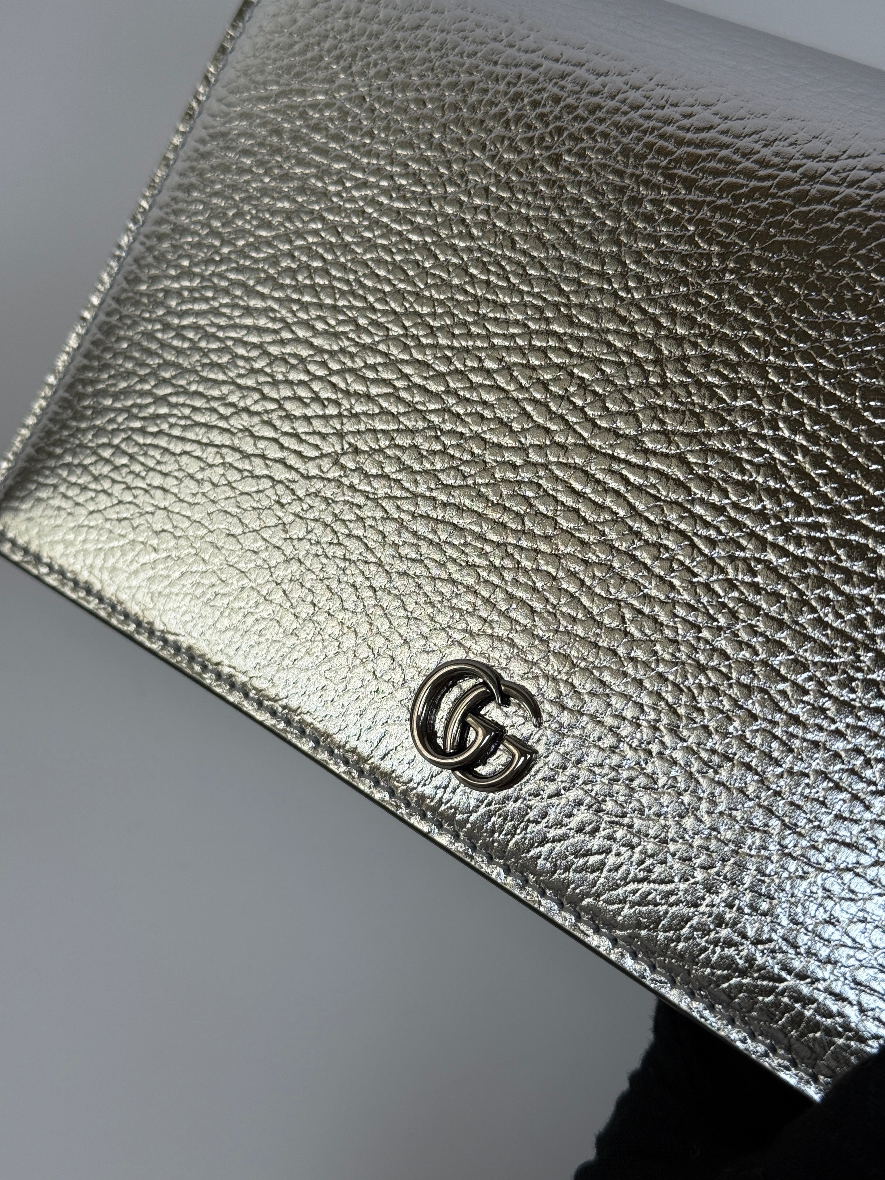 Authentic and preloved Gucci GG Marmont Leather Wallet On Chain In Metallic Silver Leather. Excellent Condition. 100% Authenticity guarantee. 