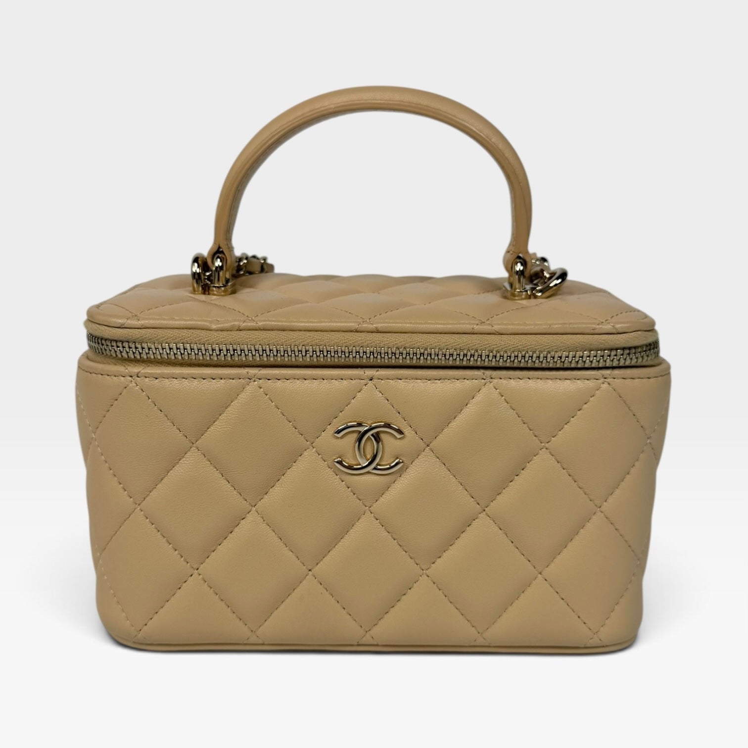 Chanel Mini Vanity Top Handle In Light Beige Lambskin Leather With Gold Hardware. Authentic and preloved in excellent condition. 