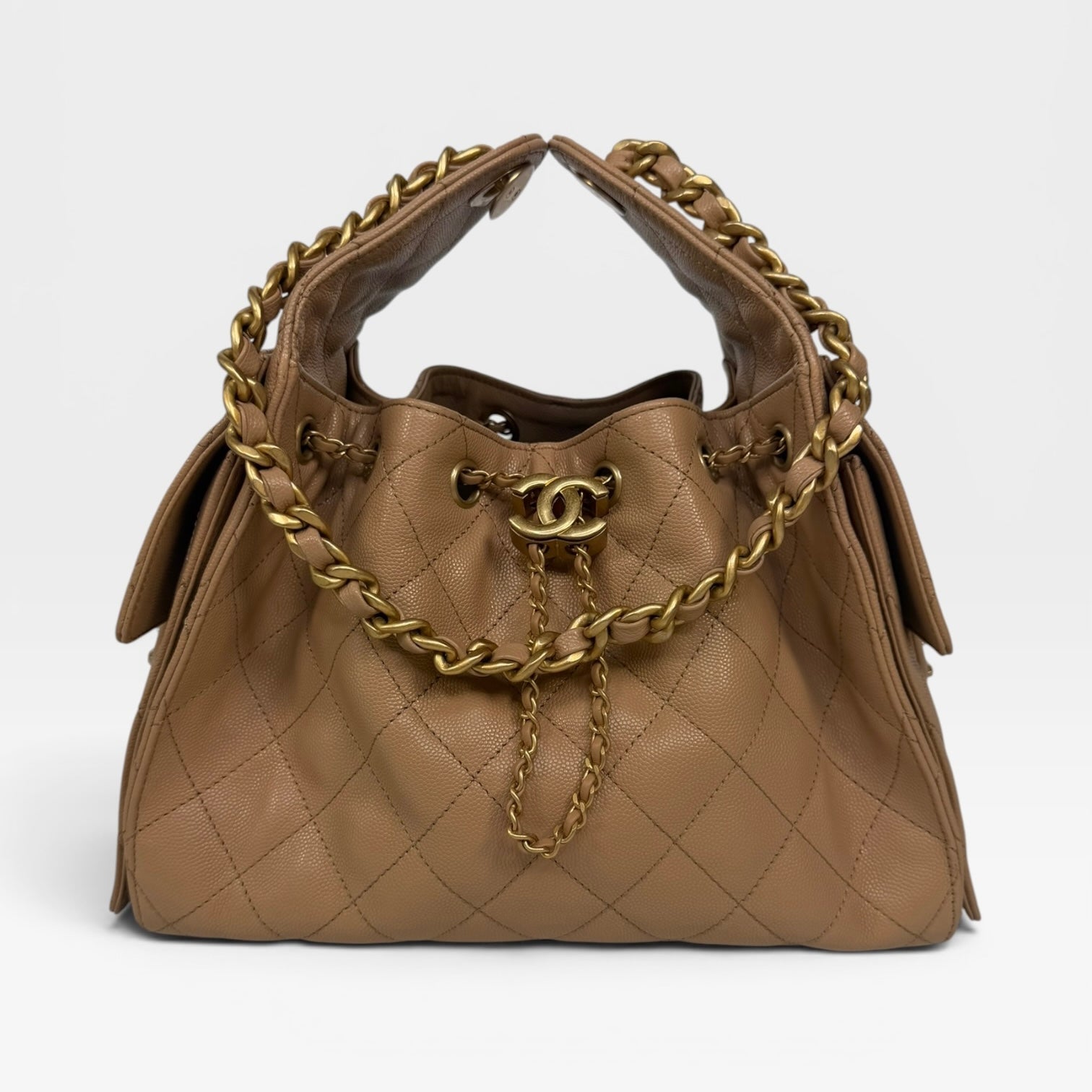 Chanel 25 Small In Beige Caviar Leather With Gold Hardware. 100% authentic and preloved in excellent condition