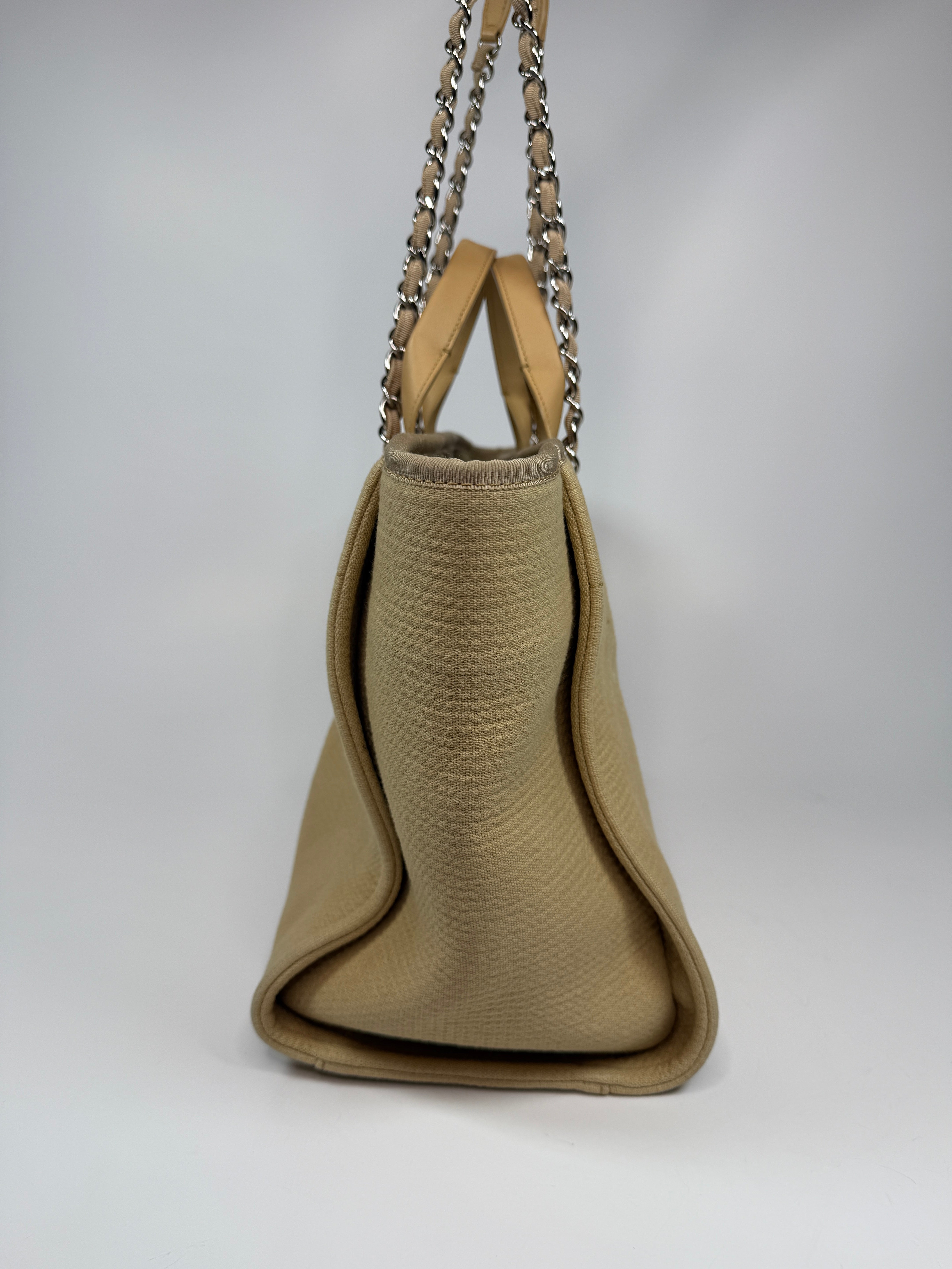 Chanel Large Deauville Tote Bag Large In Beige Fabric With Silver Hardware. Authentic and preloved In Very Good condition