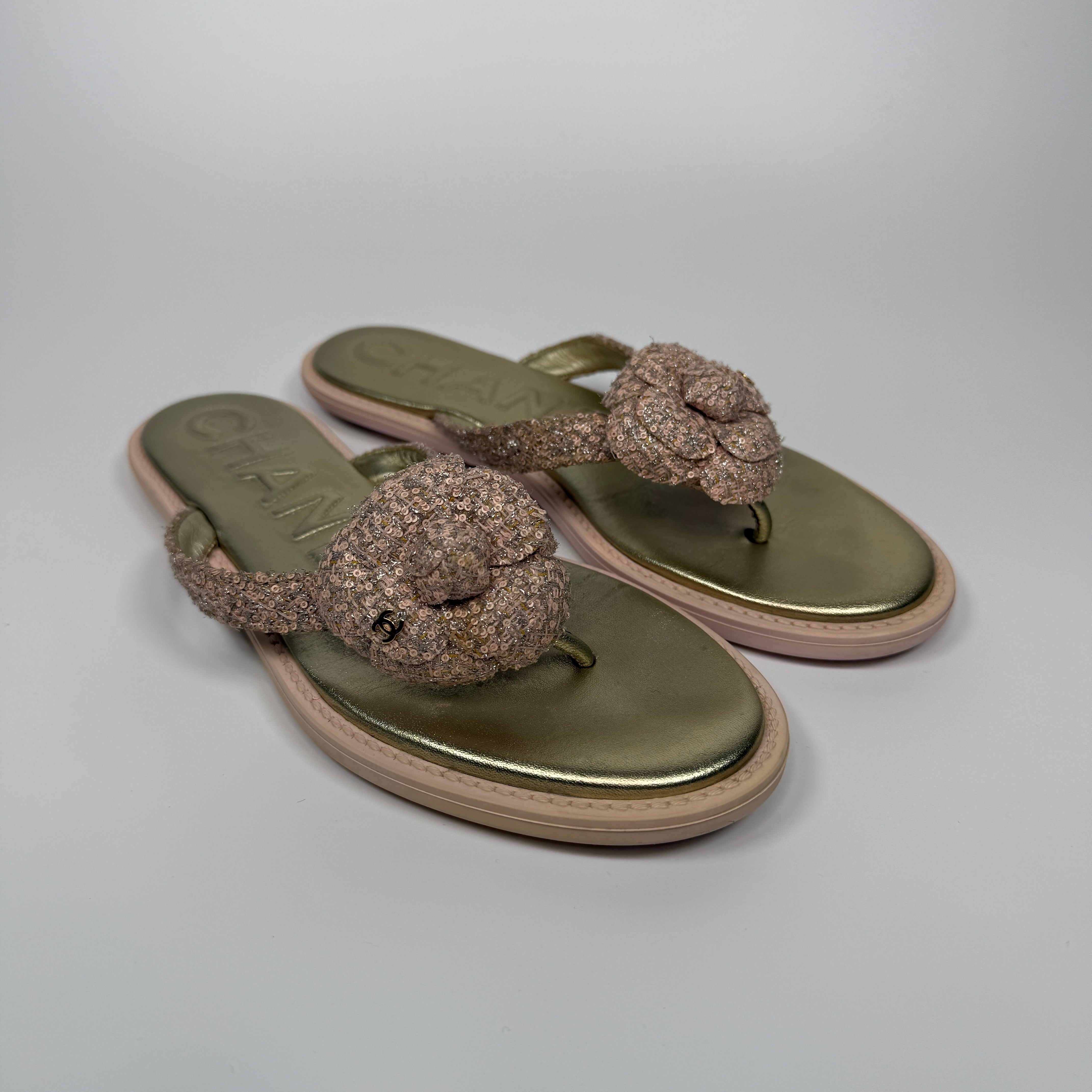 Authentic and preloved Chanel Camelia CC Thong Slides (Size 40/UK7) pink and gold tweed Good condition. 100% Authenticity guarantee.