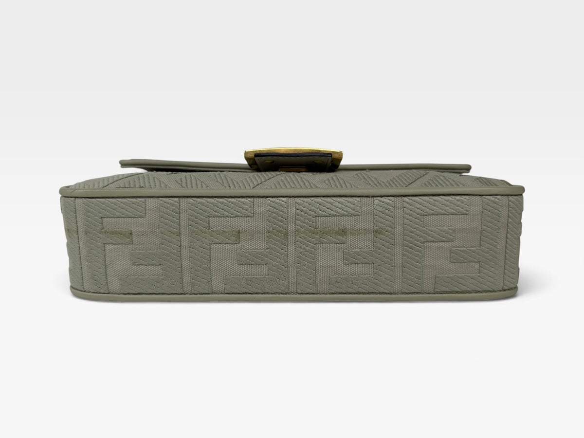 Fendi Baguette In Green Tea FF Monogram Fabric and Canvas With Gold Hardware. 100% authentic and preloved in excellent condition