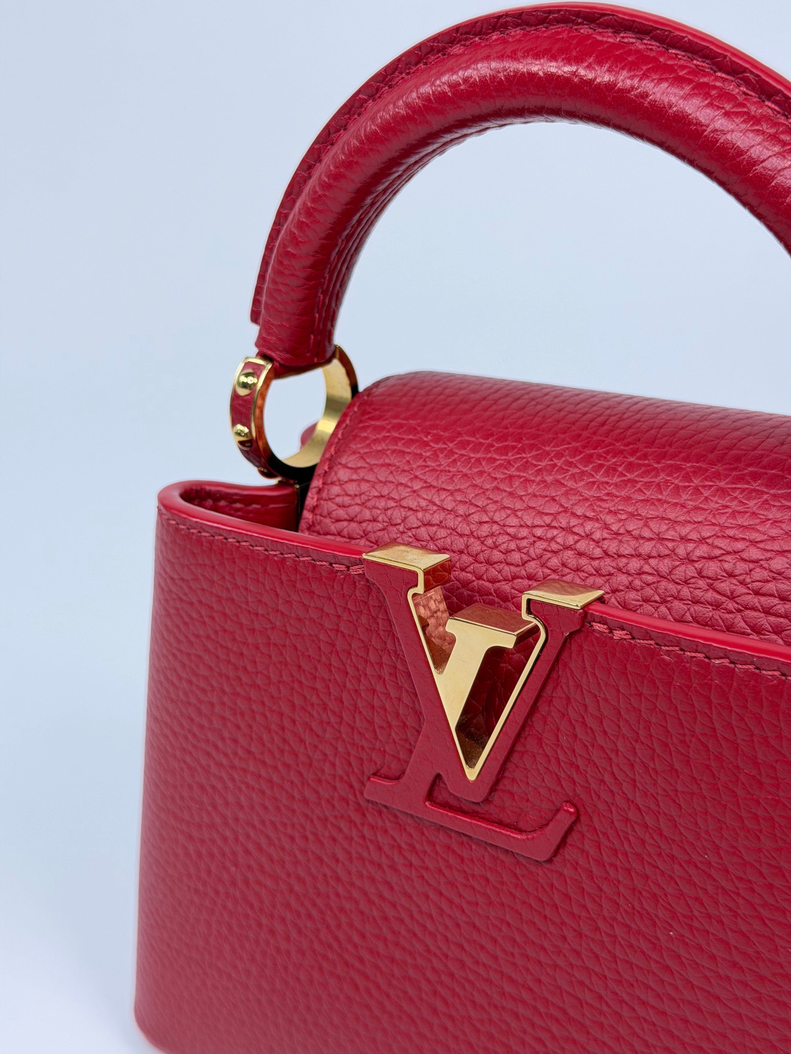 Louis Vuitton Capucines BB Bag In Scarlet Taurillion Leather With Gold Hardware. Authentic and preloved in excellent condition