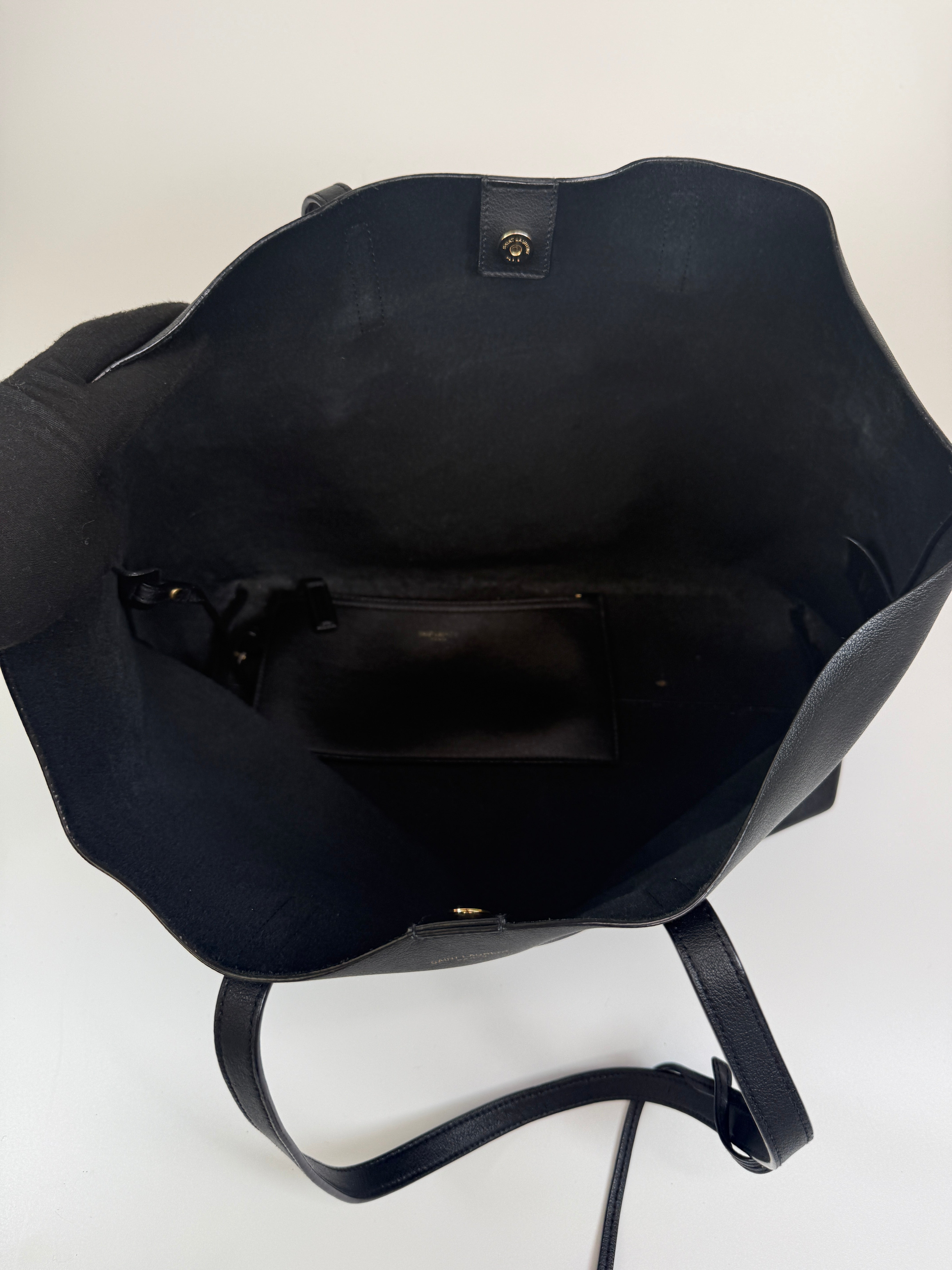 aAuthentic and preloved Saint Laurent Shopping Tote In Black Leather. 100%  Authenticity guarantee 