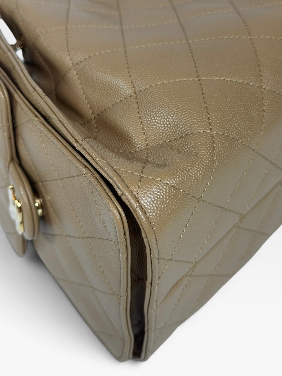 Chanel 25 Small In Brown Caviar Leather With Gold Hardware. 100% authentic and preloved in new and unused condition