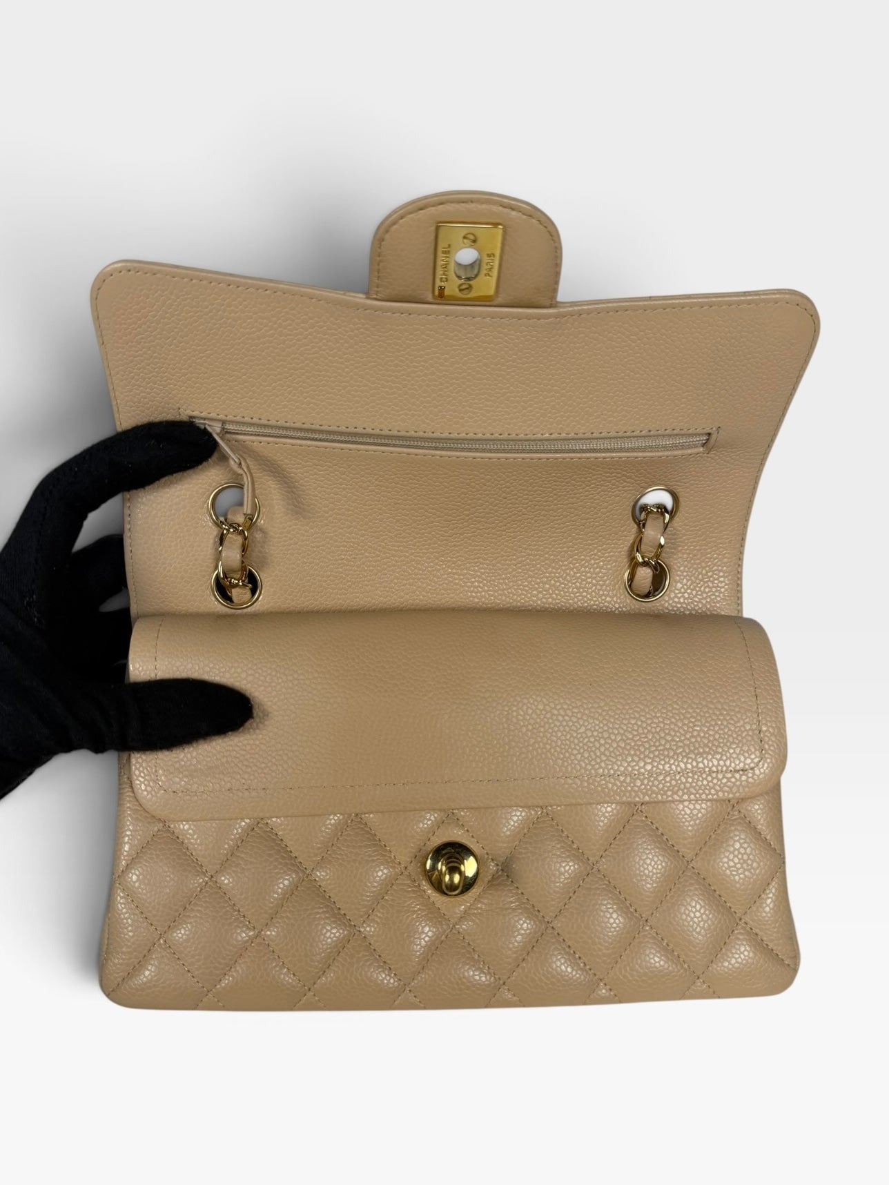 Chanel Small Classic Double Flap In Beige Caviar Leather With Gold Hardware. 100% authentic and preloved in excellent condition.