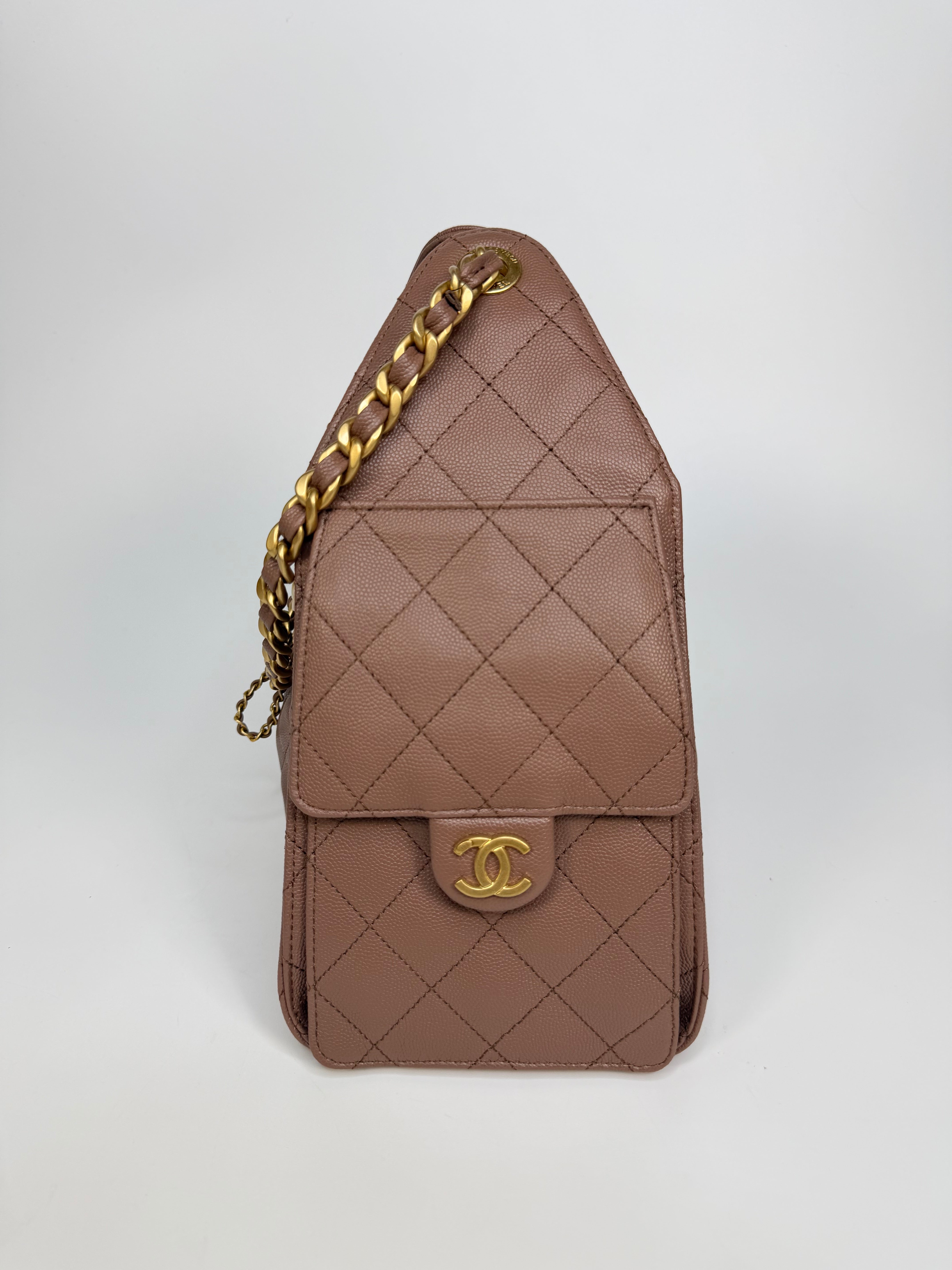 Chanel 25 Small In Brown Caviar Leather With Gold Hardware. Authentic and preloved in excellent condition