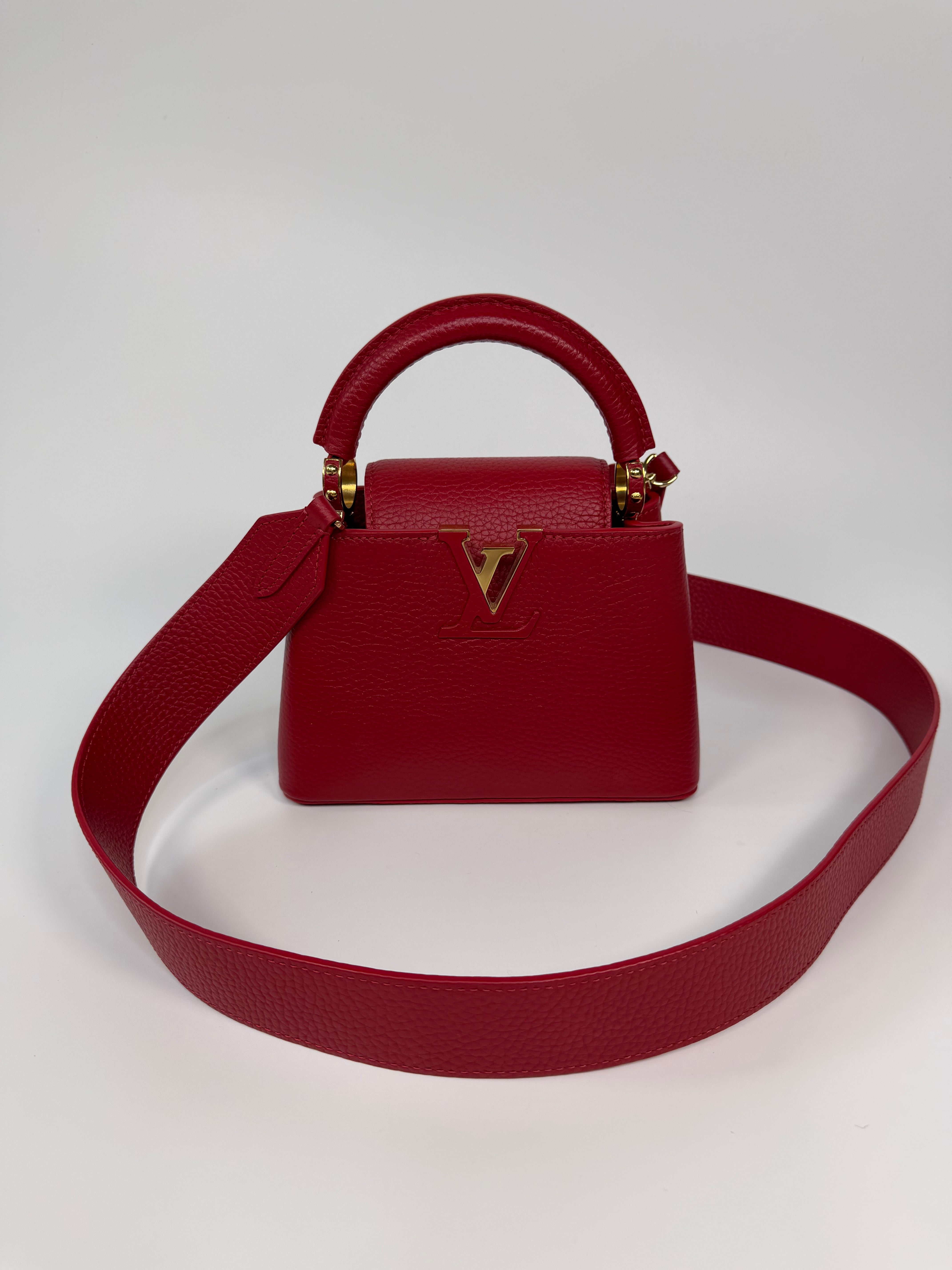 Louis Vuitton Capucines BB Bag In Scarlet Taurillion Leather With Gold Hardware. Authentic and preloved in excellent condition