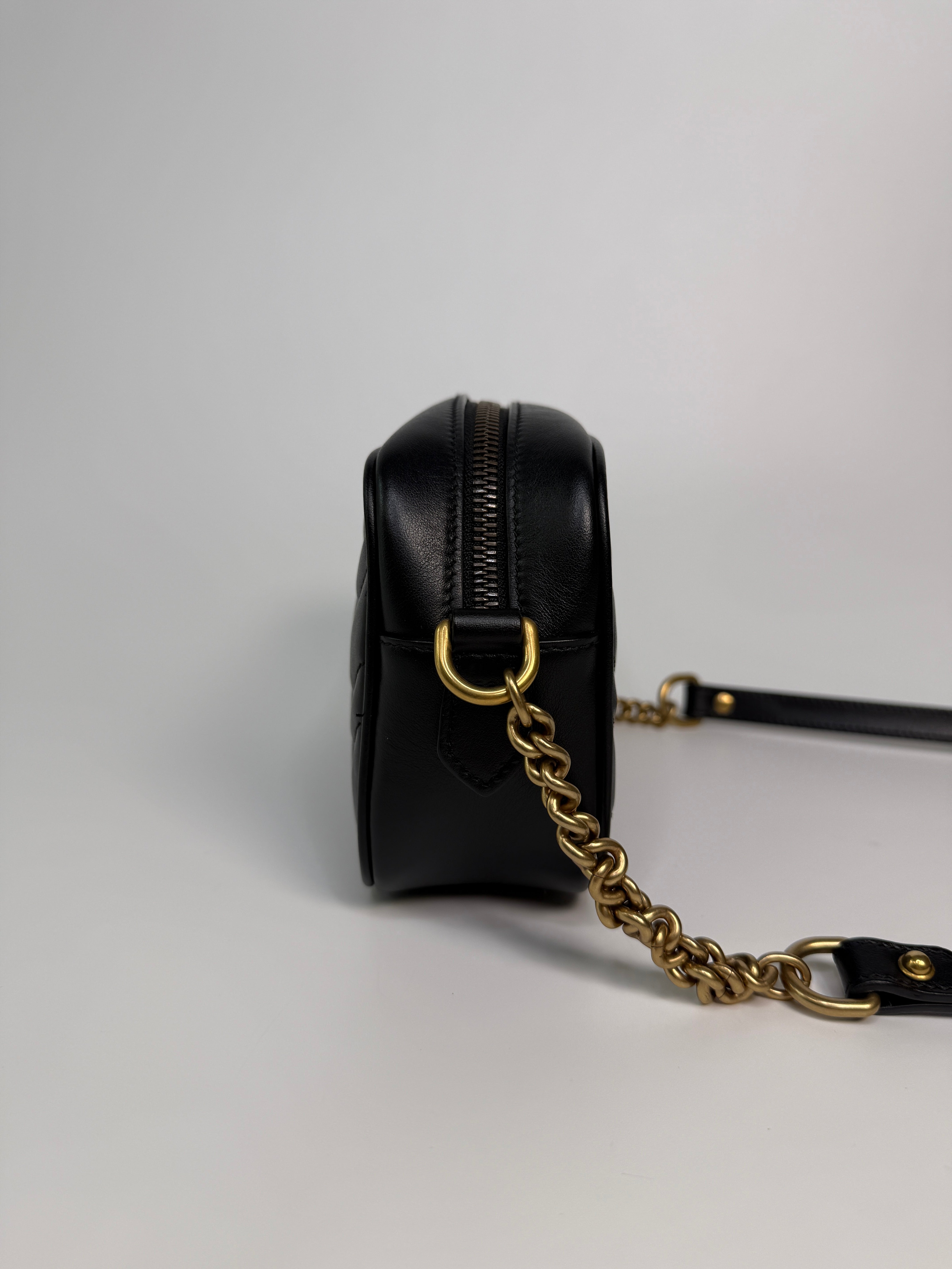 Gucci Small Marmont Camera Bag In Black Leather With Gold Hardware In Excellent Condition.
Authentic Pre Loved Verified by Luxe Cheshire Trusted Designer resale 