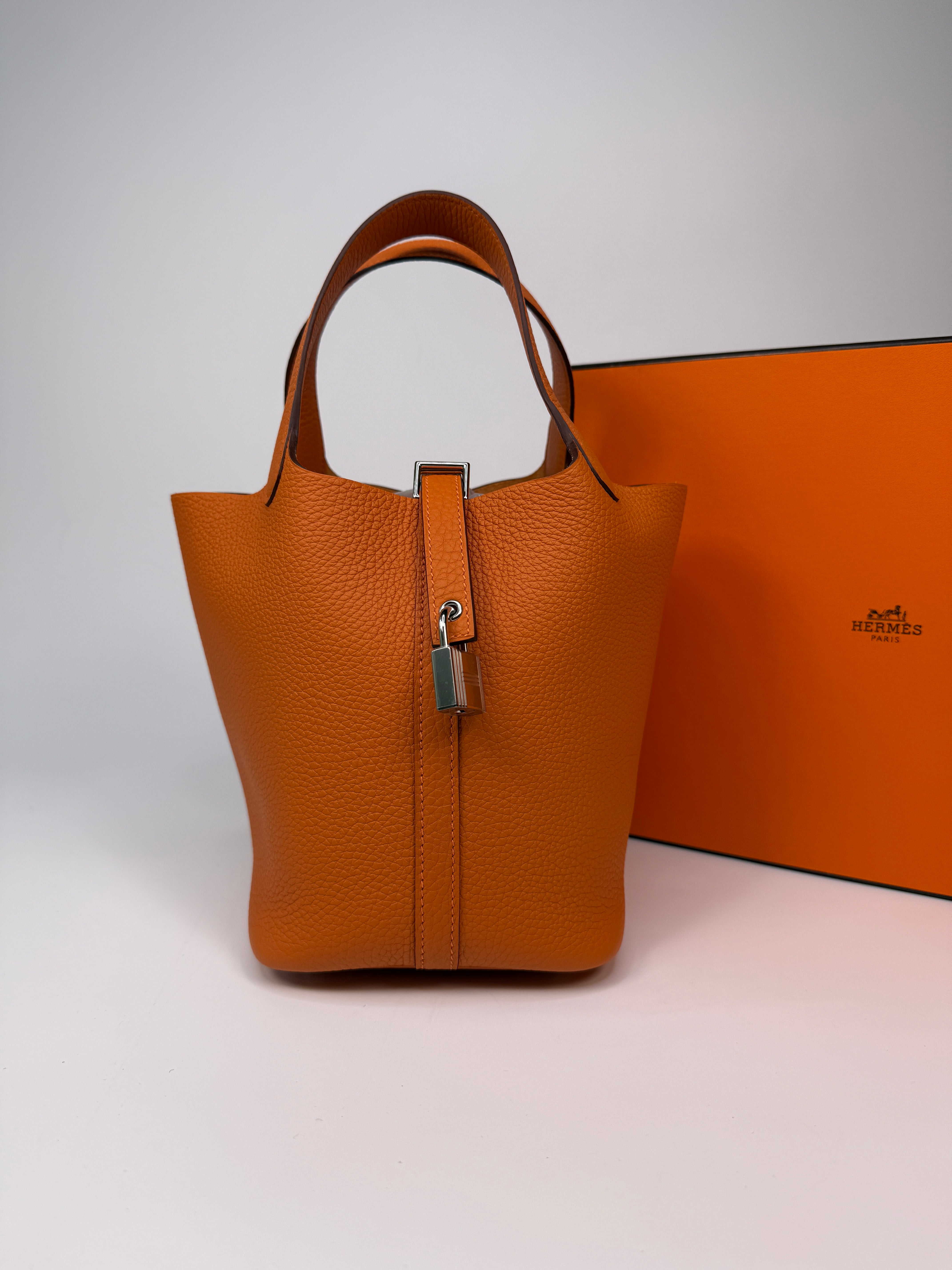 Hermès Picotin 18 In Orange Clemence Leather With Palladium Hardware
Authentic Pre Loved Verified by Luxe Cheshire Trusted Designer resale