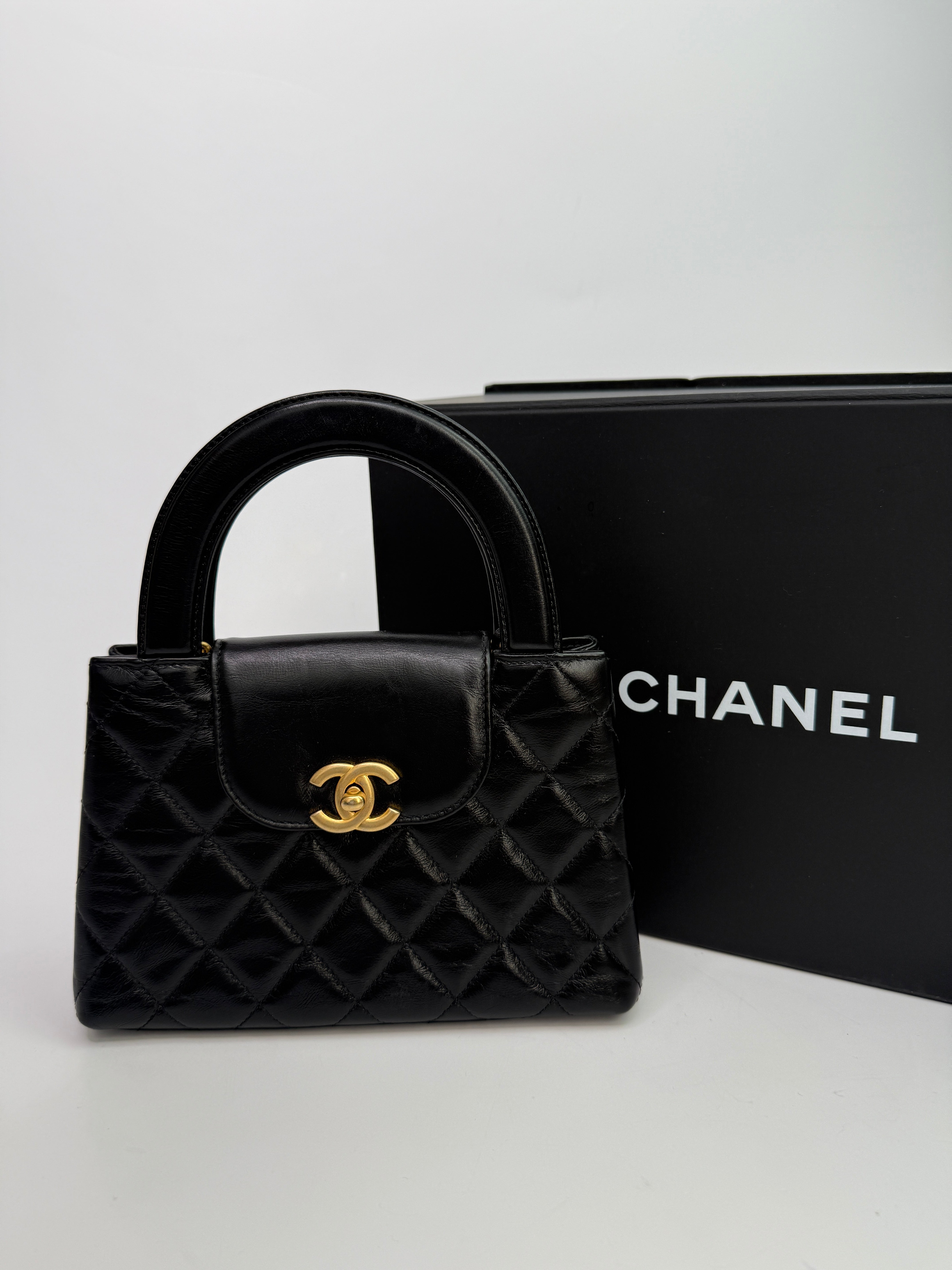 Chanel Mini Kelly Bag In Black Calfskin Leather with Gold Hardware
Pre Loved & Authentic 