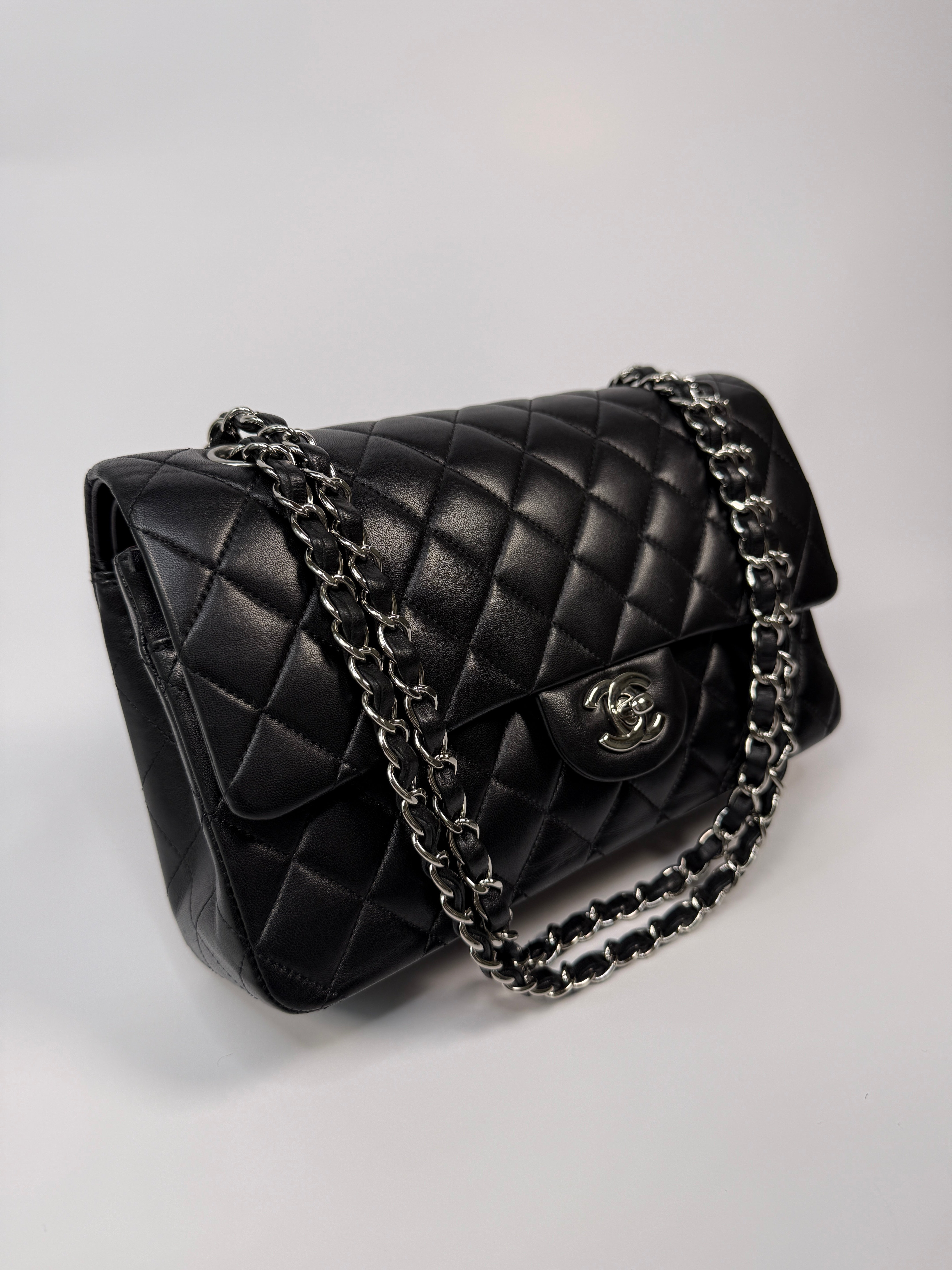 Chanel Medium Classic Double Flap Black Lambskin Leather With Silver Hardware
Pre Loved & Authentic