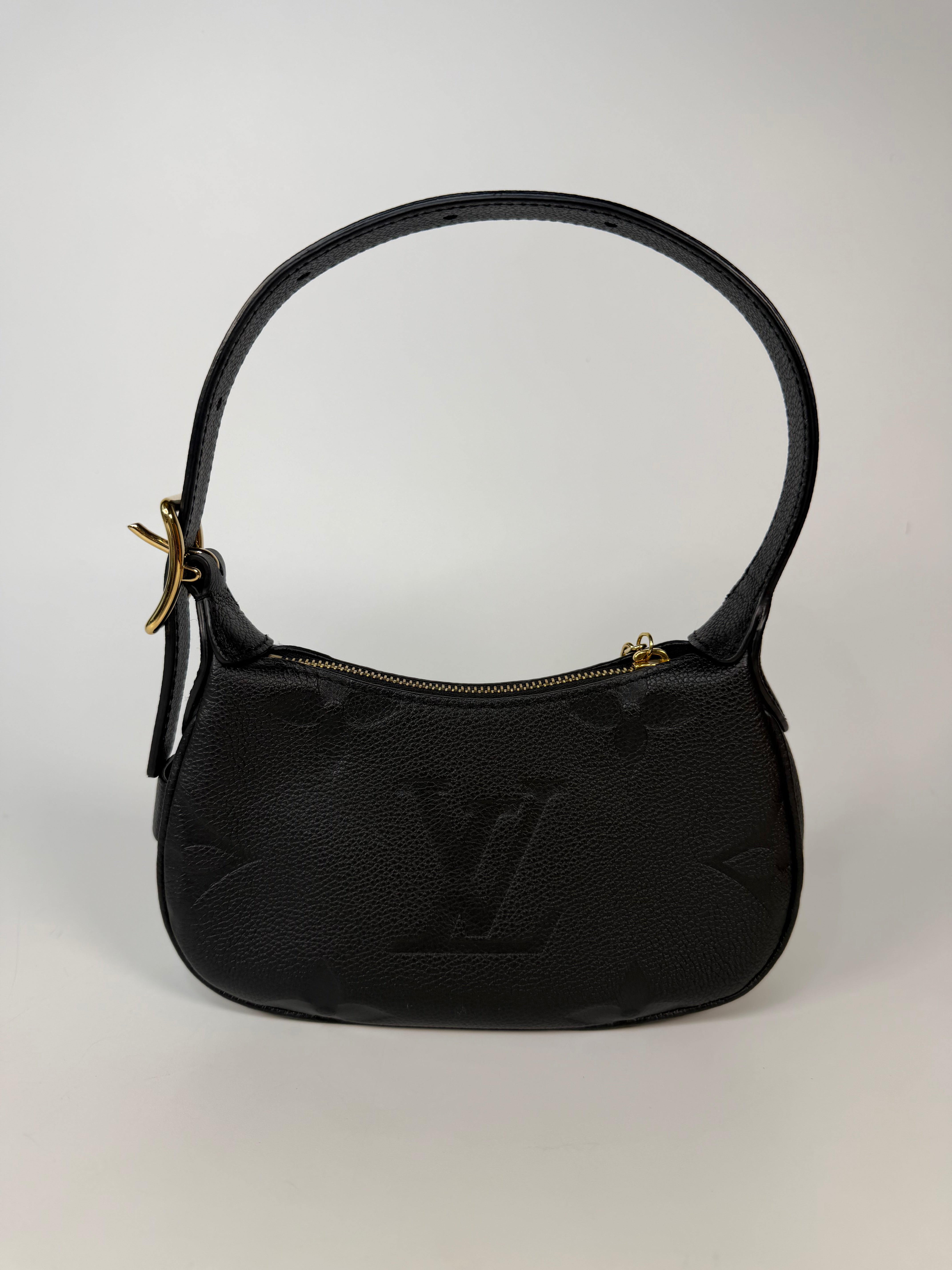Louis Vuitton Mini Moon Bag In Black Leather With Gold Hardware in excellent condition 100% authentic and preloved