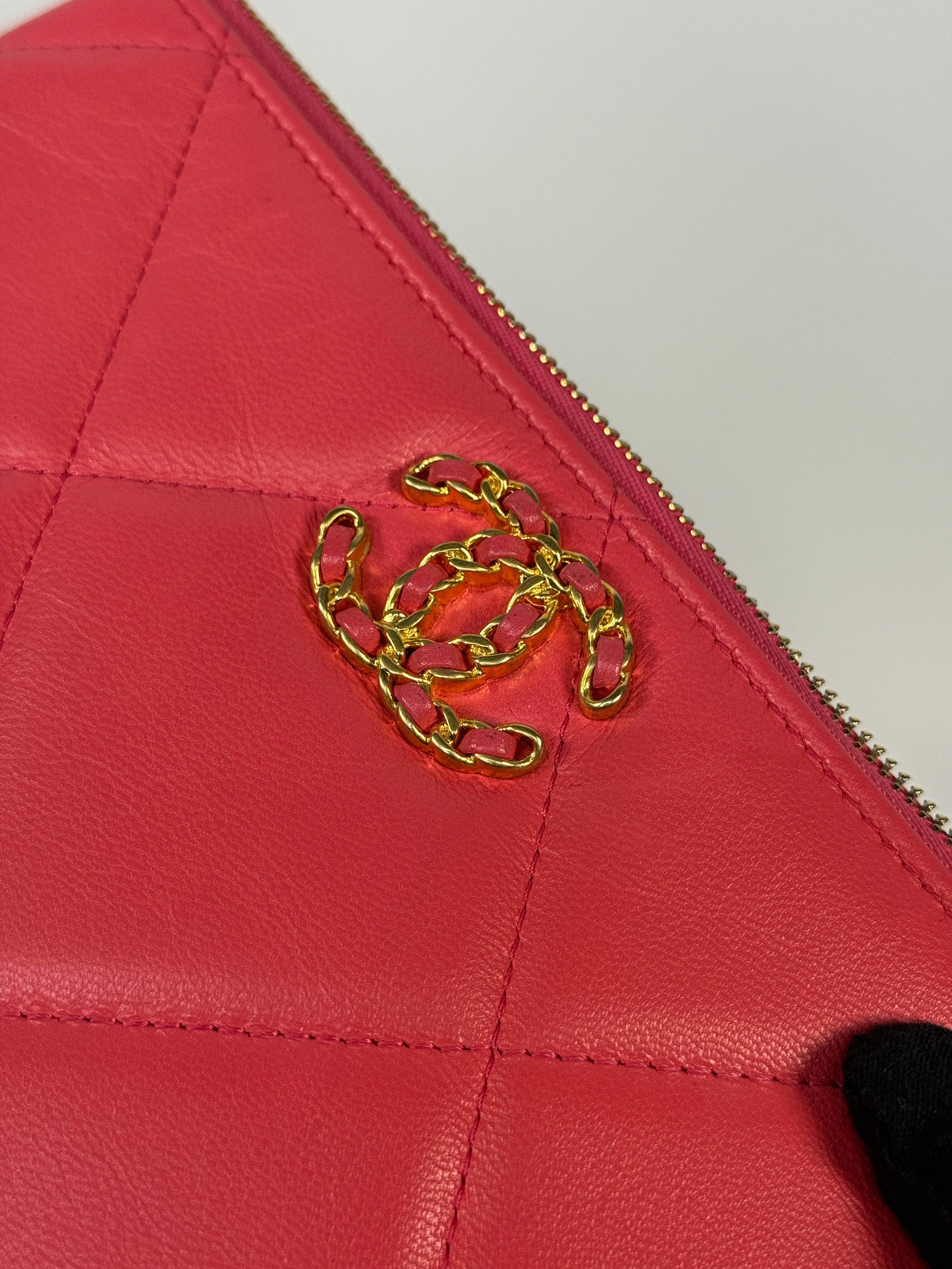 Chanel 19 Zip Pouch In Pink Calfskin Leather With Gold Hardware. Authentic preloved condition. 