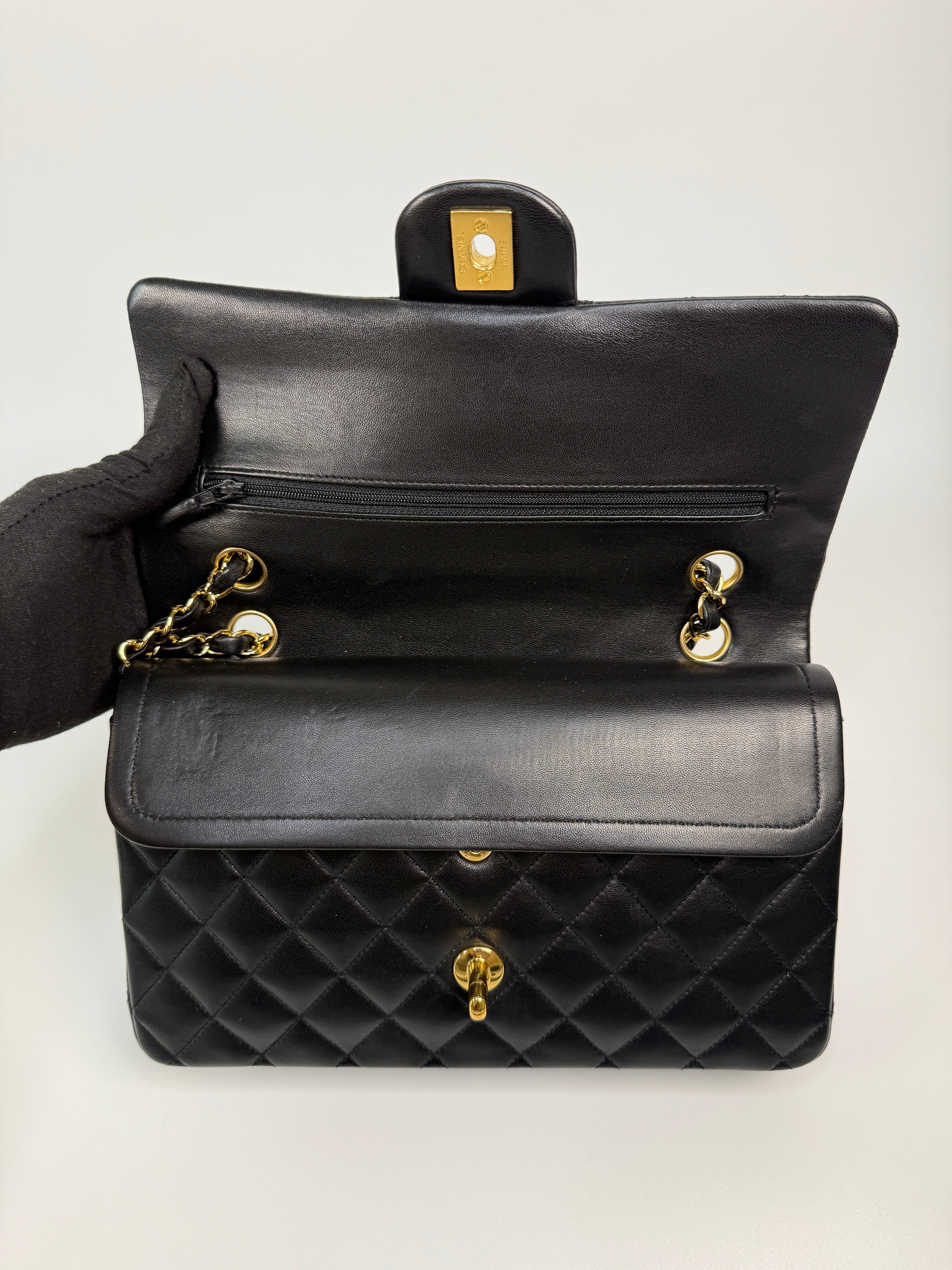 Chanel Medium Classic Double Flap Black Lambskin With Gold Hardware
Authentic Pre Loved Verified by Luxe Cheshire Trusted Designer resale