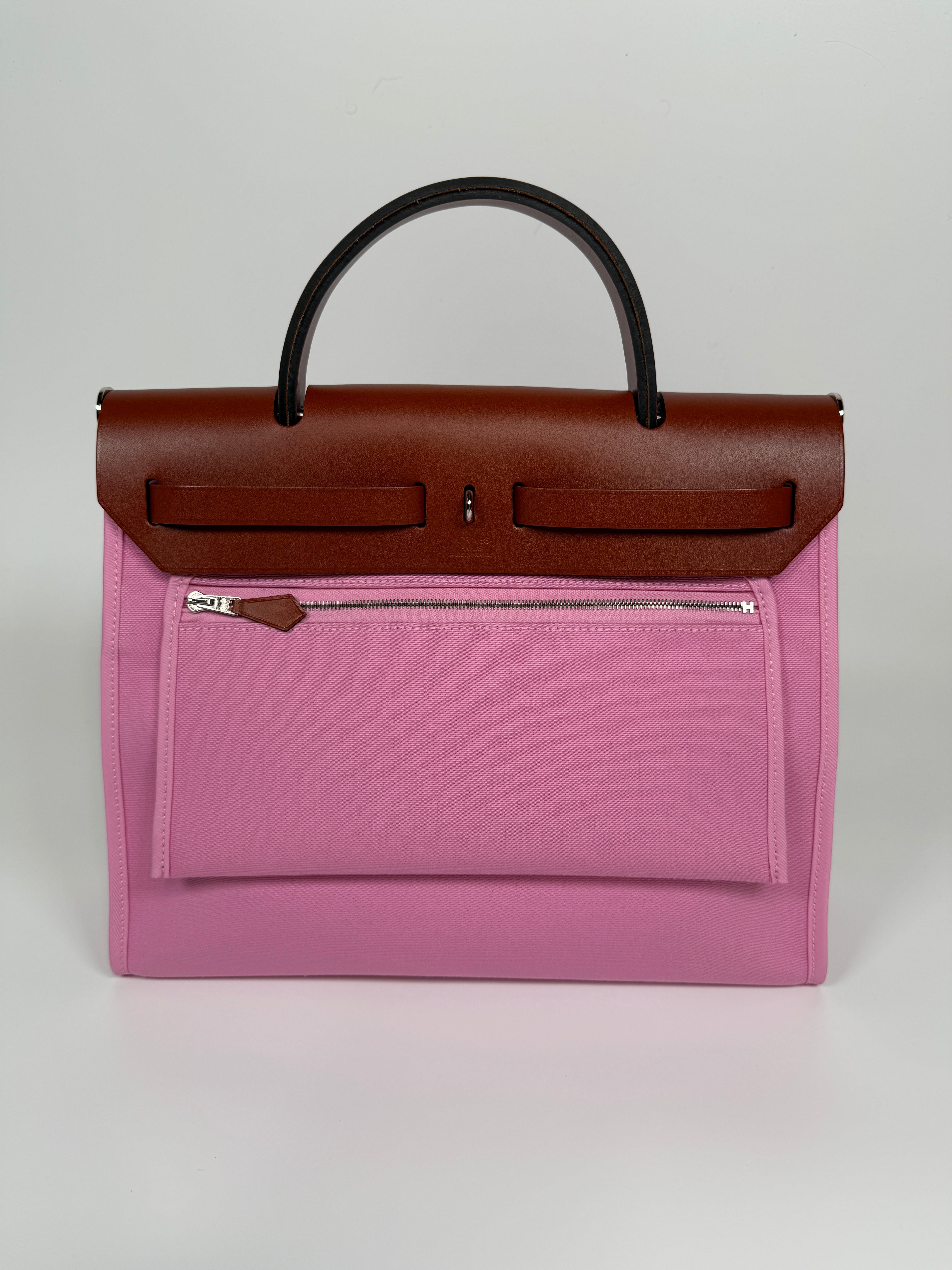 Hermès Herbag 31 Zip In Bubblegum & Cuivre Bag. New and Unused. Authentic and preloved. 100% Authenticity guarantee 
