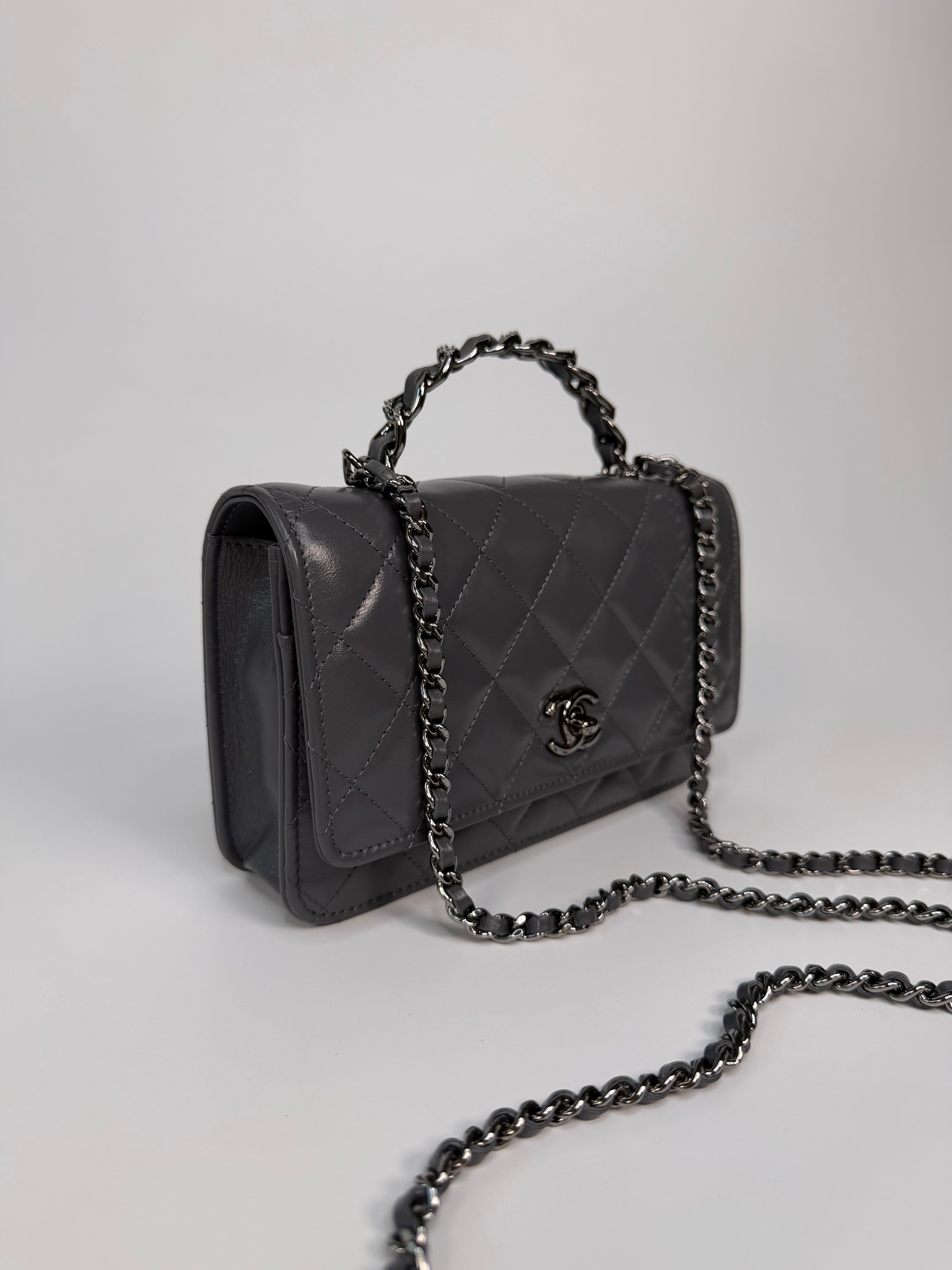 Chanel Wallet On Chain Top Handle In Grey Lambskin With Ruthenium Hardware. Authentic and preloved in excellent condition. 100% guarantee