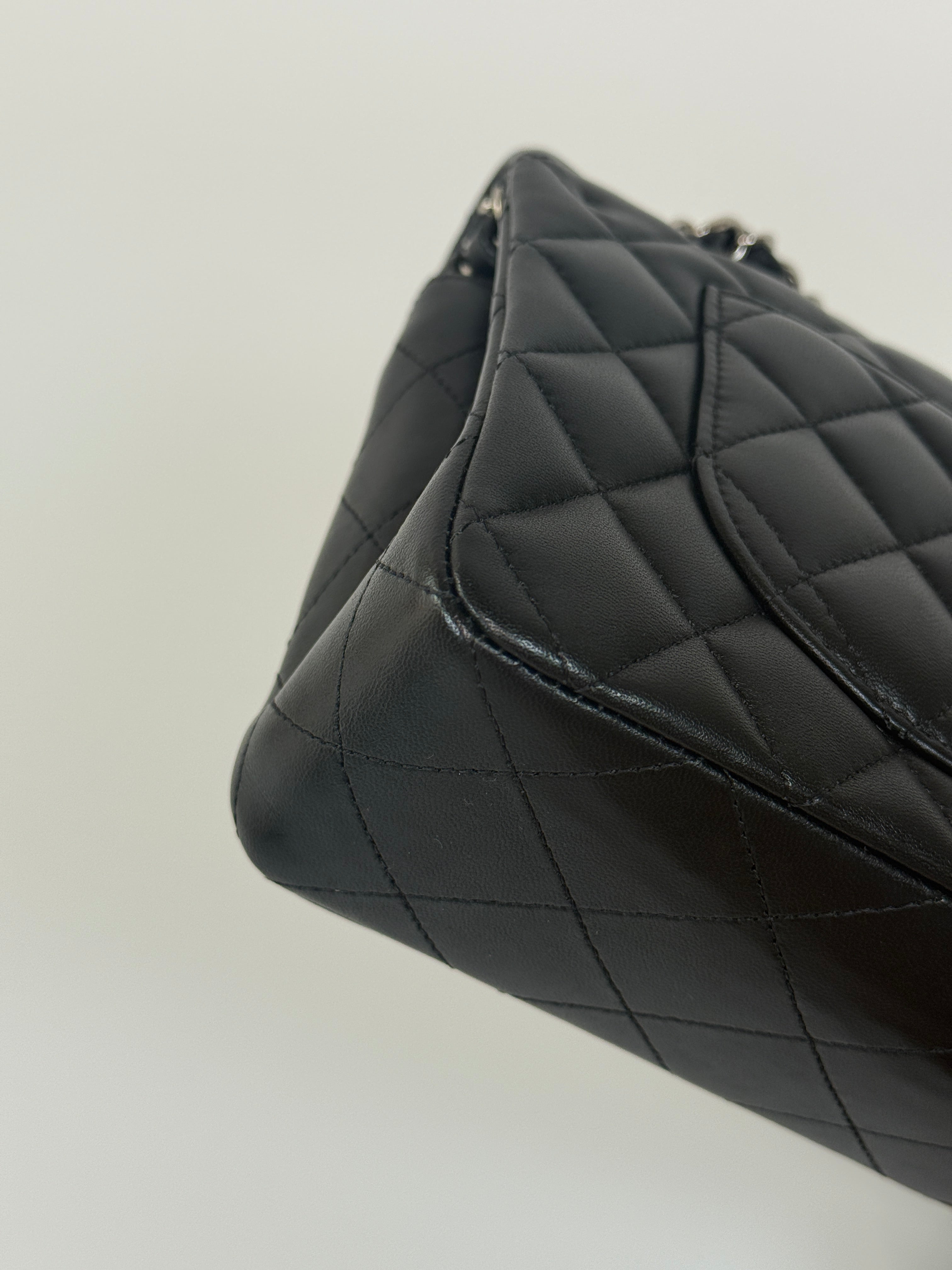 Chanel Small Classic Double Flap In Black Lambskin Leather With Silver Hardware Authentic and preloved in excellent condition. 100% Authenticity guarantee