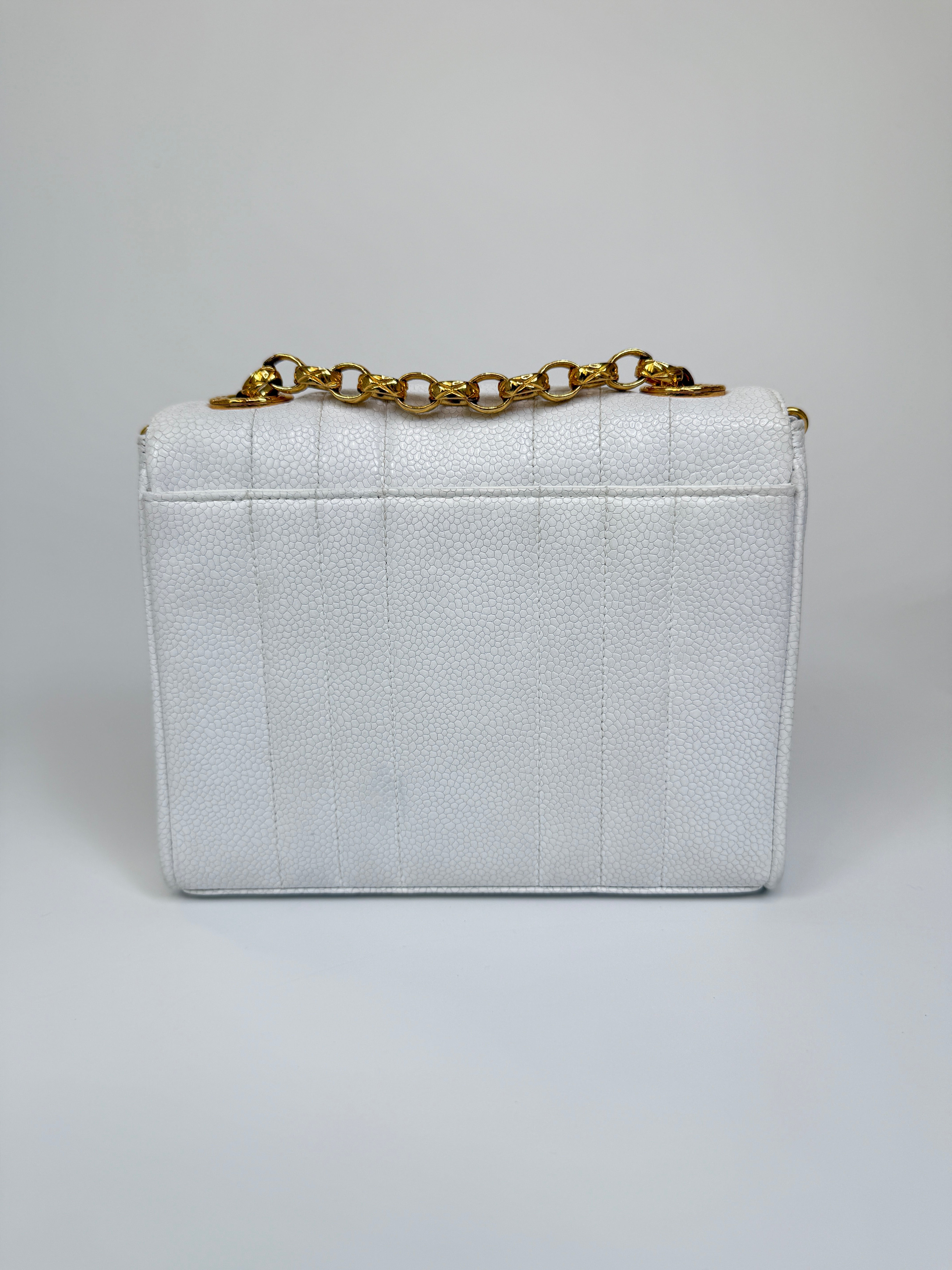 Chanel Vintage Mini Square Flap In White Caviar Leather With 24kt Gold Hardware. Excellent condition 100% Authenticity Guarantee 