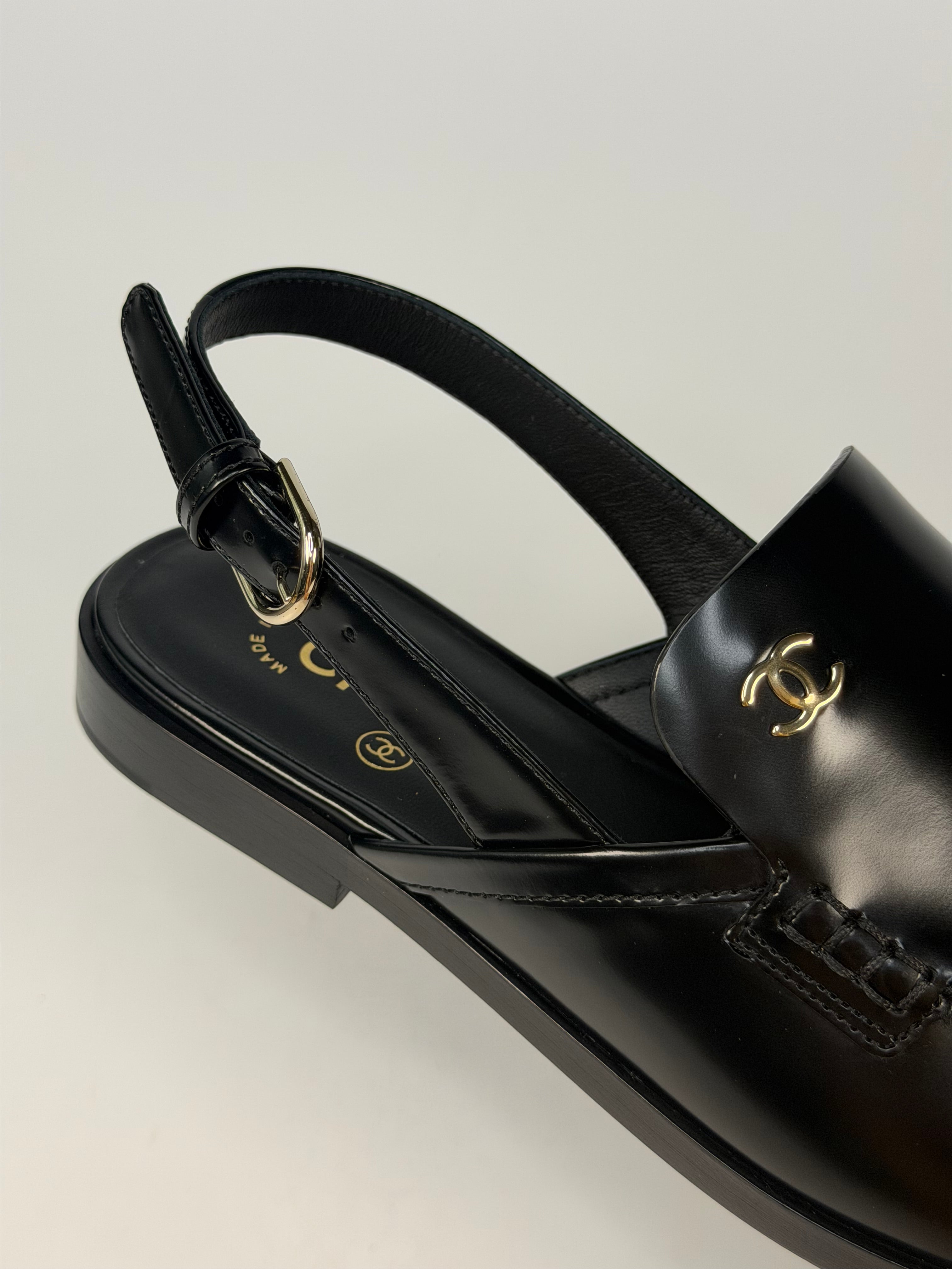 Chanel Spring/Summer Slingback In Black Shiny Calfskin (Size 38.5). Authentic and preloved in new/unused condition. verified by luxe cheshire. insured next day delivery
