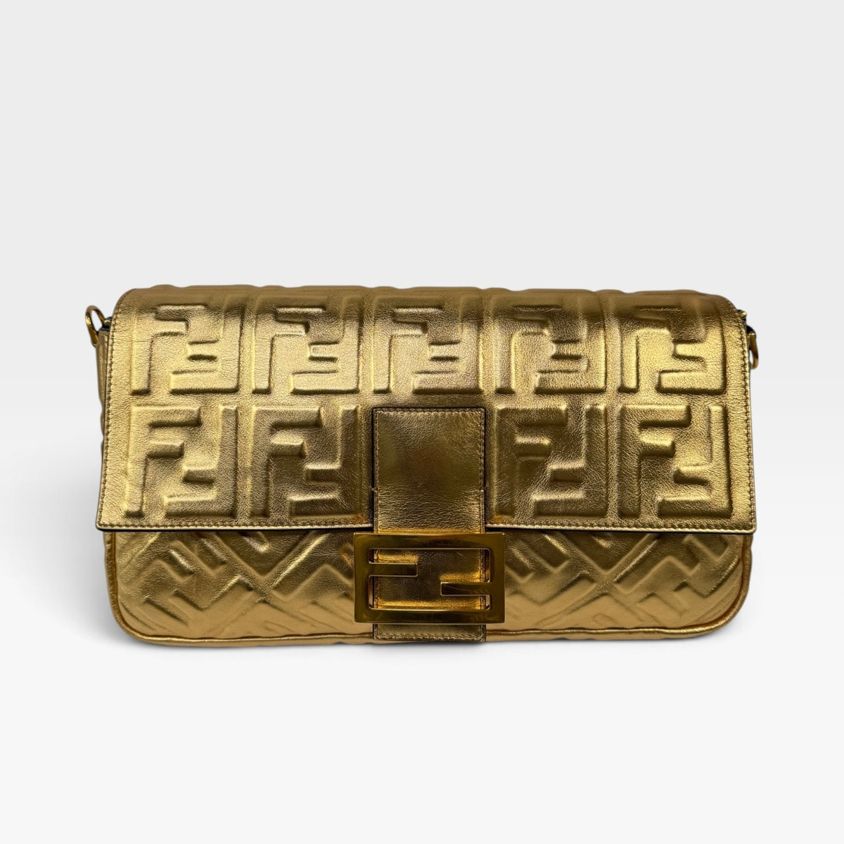 Fendi Large Baguette In Gold Leather Monogram With Gold Hardware. 100% authentic and preloved in excellent condition