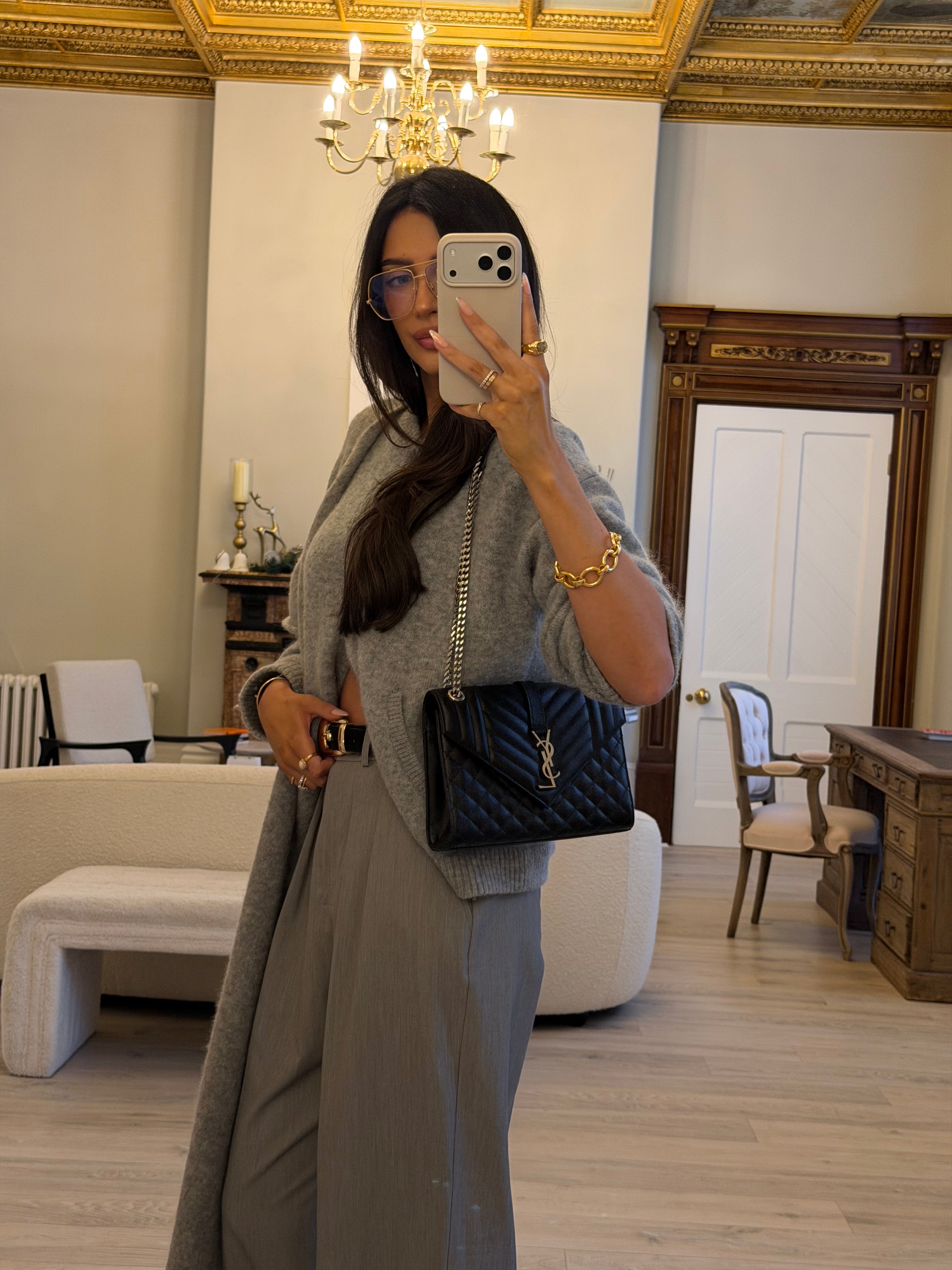 Saint Laurent Medium Envelope Bag In Blacked Grained Leather With Silver Hardware. Authentic and preloved. Excellent Condition