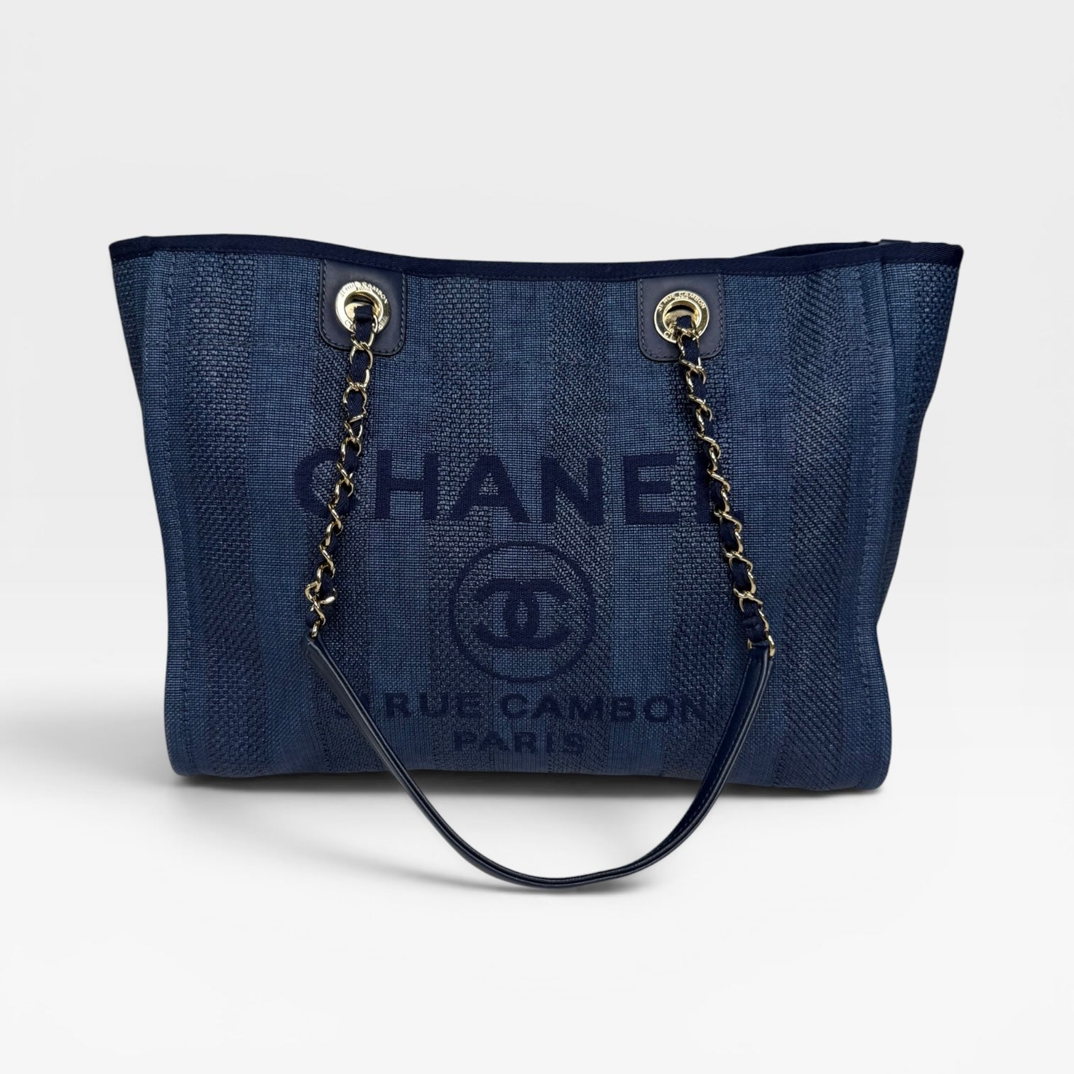 Chanel Small Deauville Tote Bag In Black With Gold Hardware. Authentic and preloved in excellent condition with 100% authenticity guarantee.
