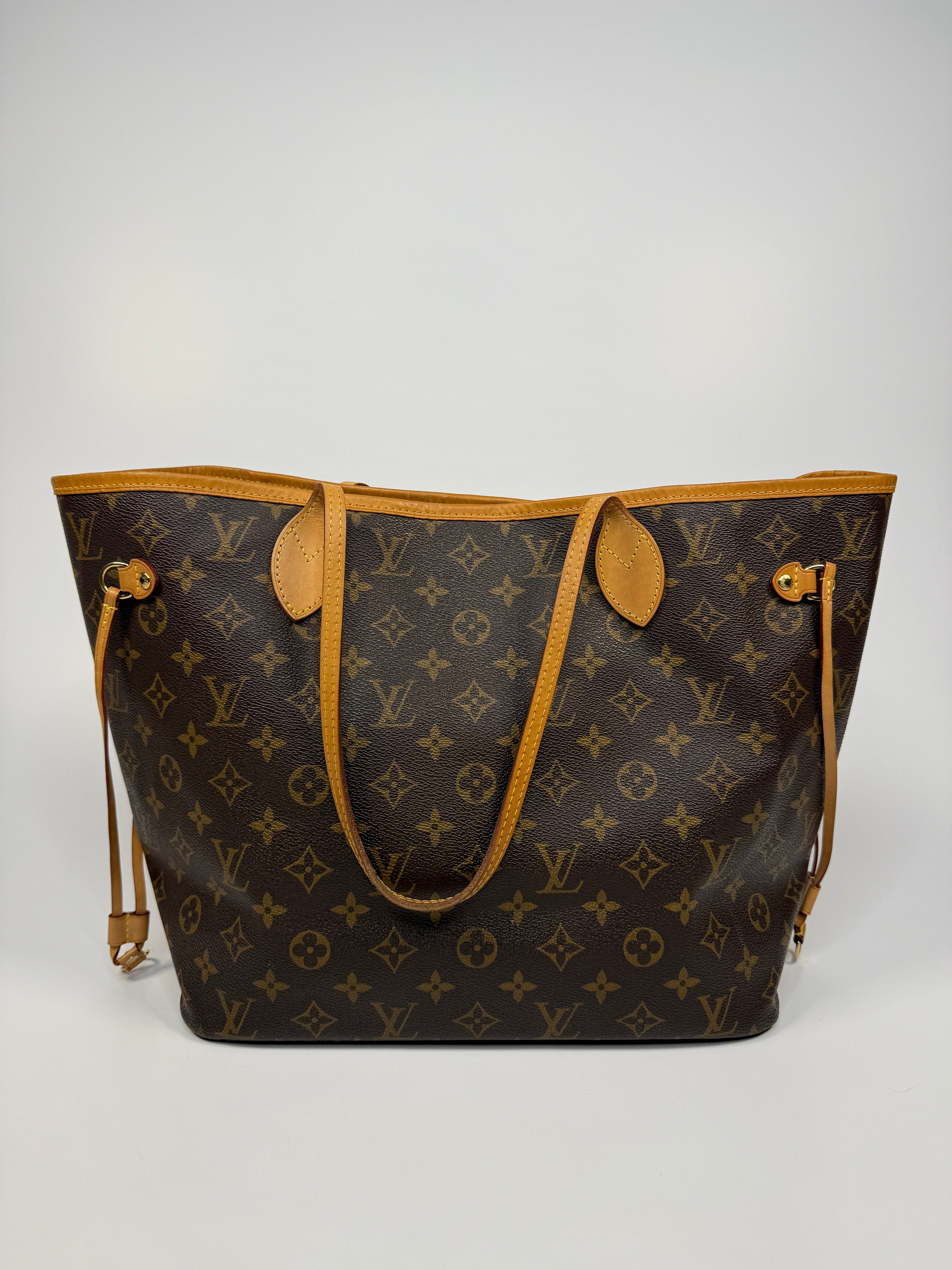Louis Vuitton Neverfull MM Bag In Brown Monogram . Excellent. Authentic and preloved. 