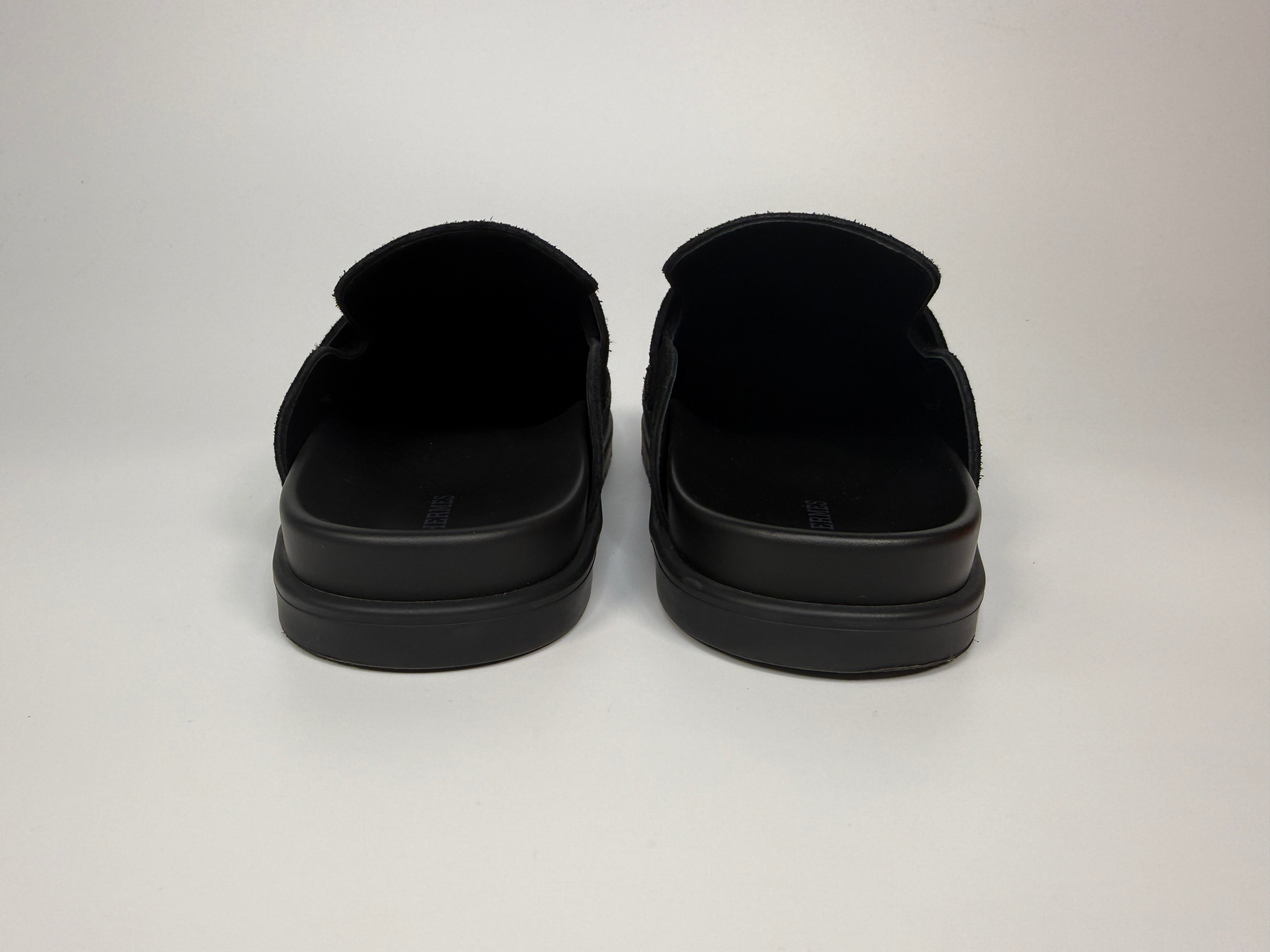 Authentic and preloved Hermès Go Mules In Black  (EU38/ UK5) Excellent condition. Verified by Luxe Cheshire