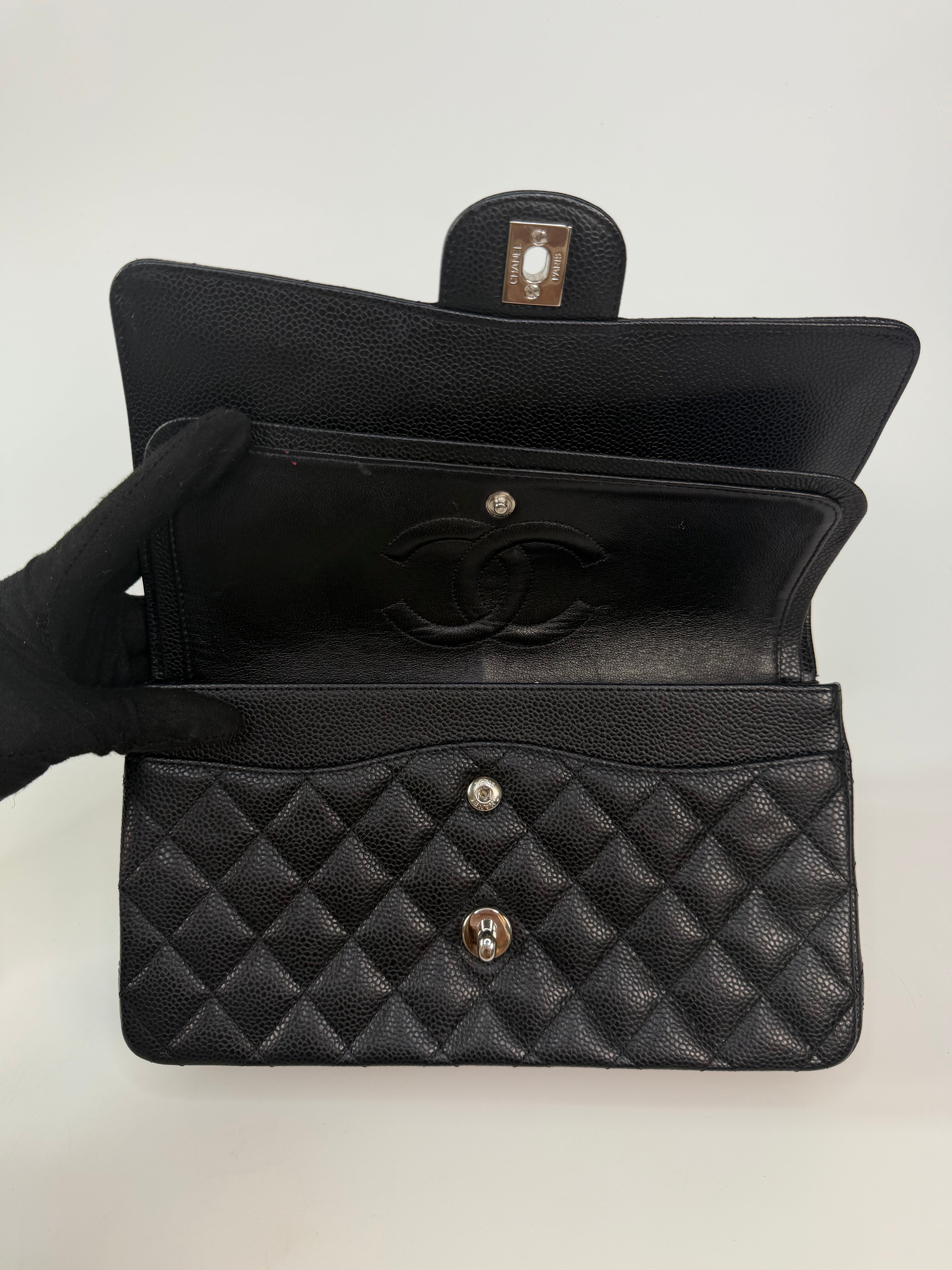 Chanel Vintage Medium Classic Double Flap Black Caviar Silver Hardware. 100% authentic and preloved in excellent condition