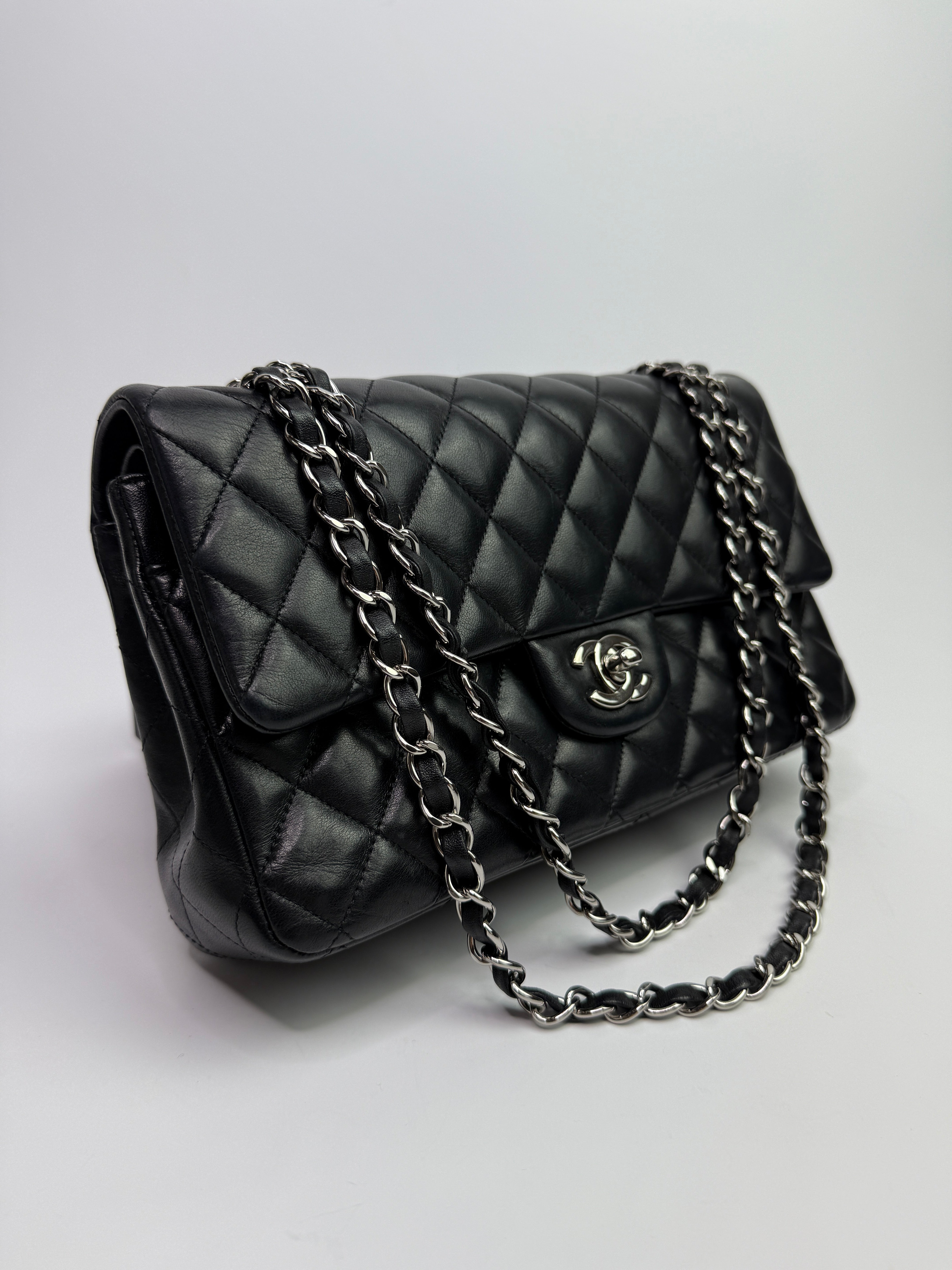 Chanel Medium Classic Double Flap Black Lambskin With Silver Hardware
Pre Loved & Authentic 